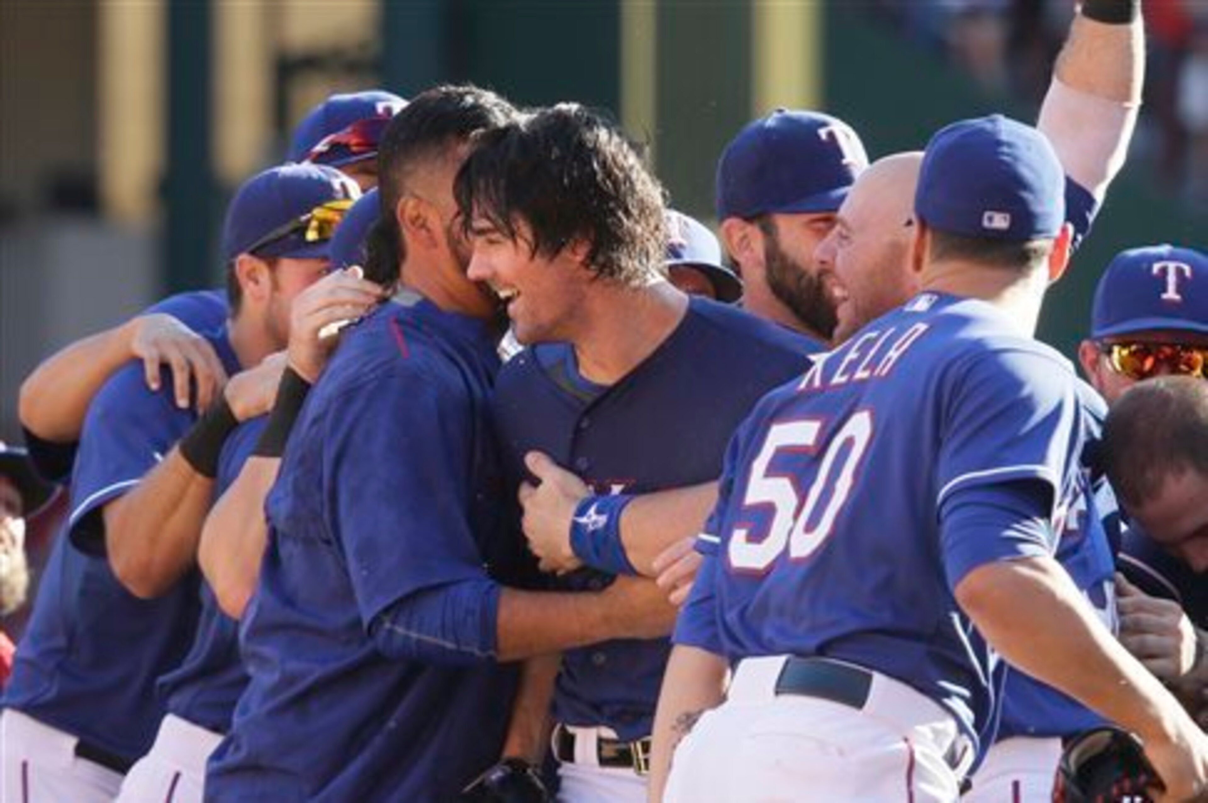 Cole Hamels, who came to Texas in a trade-deadline deal, pitched a complete game to clinch the AL West crown.