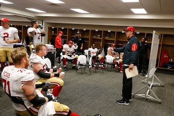 PITTSBURGH, PA - SEPTEMBER 20: Offensive Coordinator Geep Chryst of the San Francisco 49ers addresses the team in the locker room during halftime of the game against Pittsburgh Steelers at Heinz Field on September 20, 2015 in Pittsburgh, Pennsylvania. The