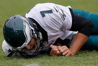 LANDOVER, MD - OCTOBER 04: Quarterback Sam Bradford #7 of the Philadelphia Eagles reacts after getting hit during their 23-20 loss to the Washington Redskins at FedExField on October 4, 2015 in Landover, Maryland.  (Photo by Rob Carr/Getty Images)