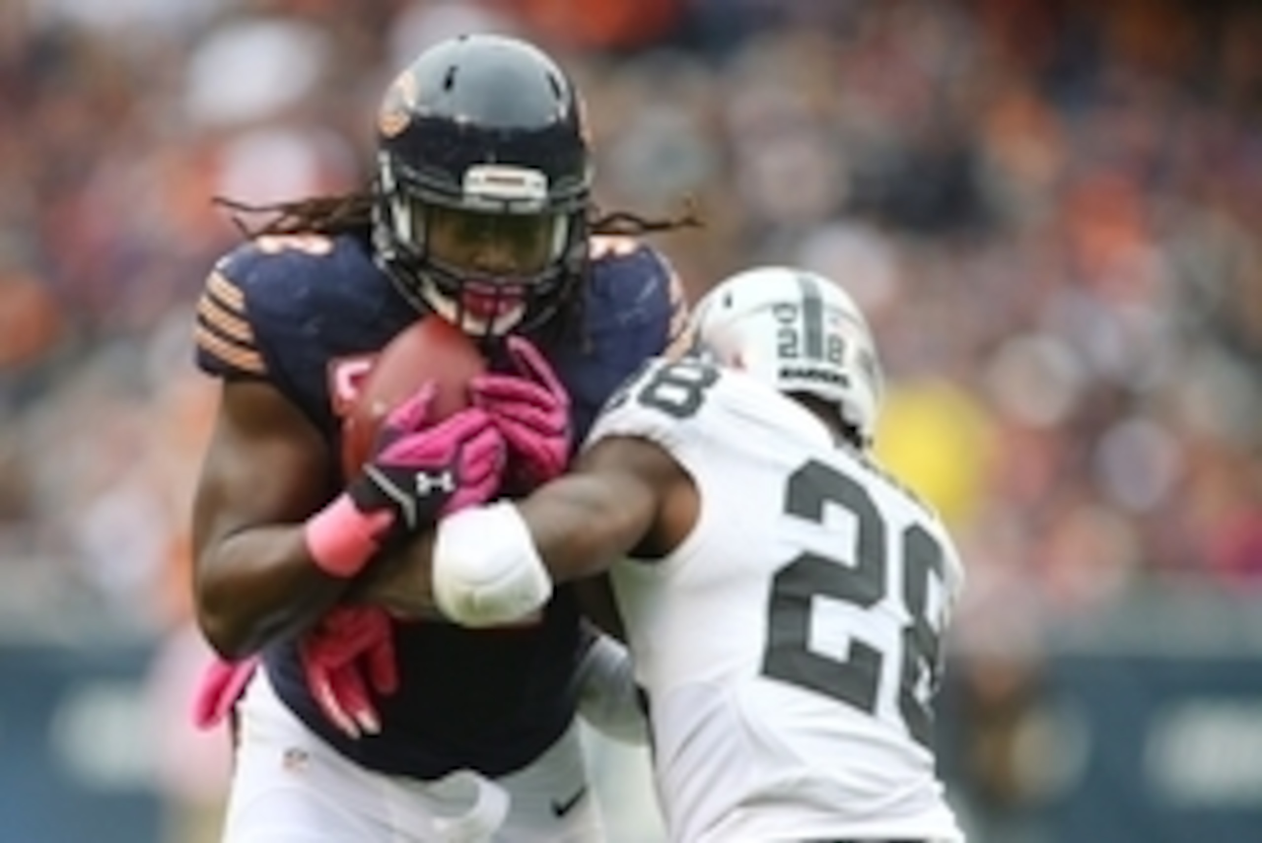 Oct 4, 2015; Chicago, IL, USA; Chicago Bears outside linebacker Pernell McPhee (92) intercepts a pass intended for Oakland Raiders running back Latavius Murray (28) during the second quarter at Soldier Field. Mandatory Credit: Jerry Lai-USA TODAY Sports