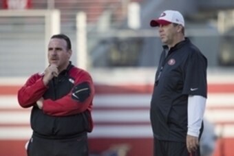 August 1, 2015; Santa Clara, CA, USA; San Francisco 49ers head coach Jim Tomsula (left) and offensive coordinator Geep Chryst (right) during training camp at Levi's Stadium. Mandatory Credit: Kyle Terada-USA TODAY Sports