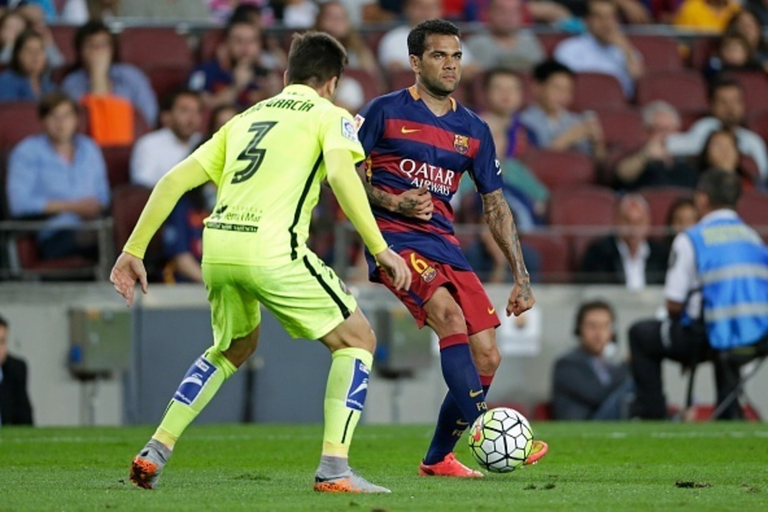 (L-R) Tono of Levante UD, Daniel Dani Alves of FC Barcelona during the Primera Division match between FC Barcelona and Levante UD on September 20, 2015 at Camp Nou stadium in Barcelona, Spain.(Photo by VI Images via Getty Images)