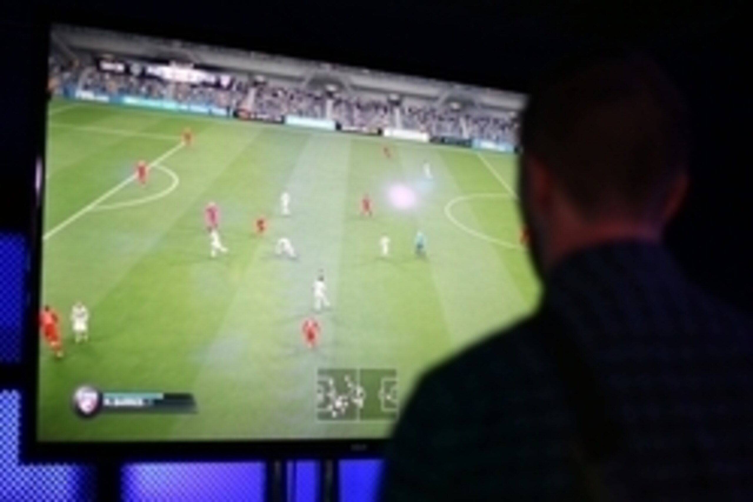 Sep 21, 2015; New York, NY, USA; Soccer fans  play FIFA 16 a day before it hits stores during a launch party from EA Sports at Highline Ballroom. Mandatory Credit: Danny Wild-USA TODAY Sports