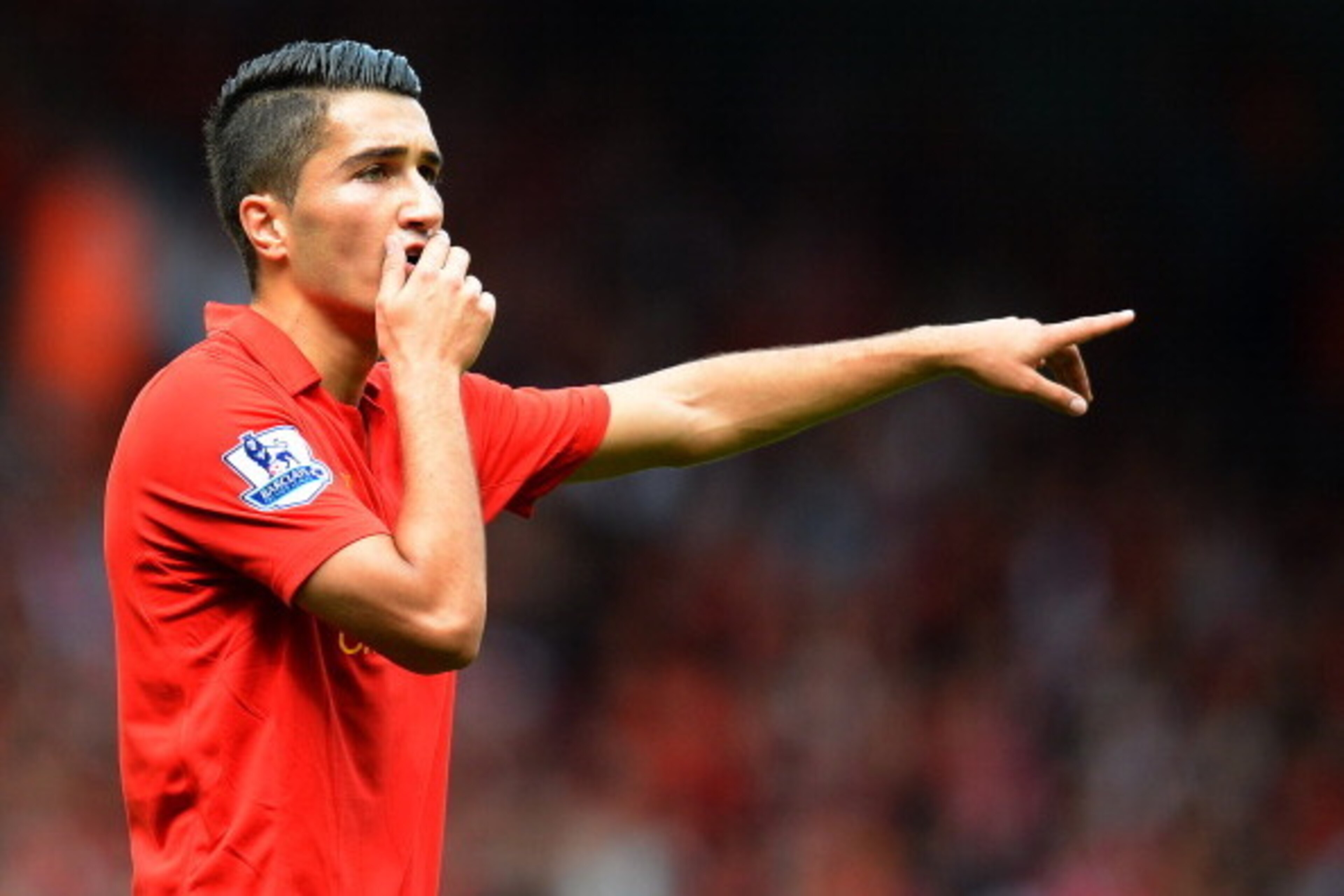 Liverpool's Turkish midfielder Nuri Sahin reacts during the English Premier League football match between Liverpool and Arsenal at Anfield in Liverpool, north-west England on September 2, 2012.    AFP PHOTO/ ANDREW YATES
RESTRICTED TO EDITORIAL USE. No us