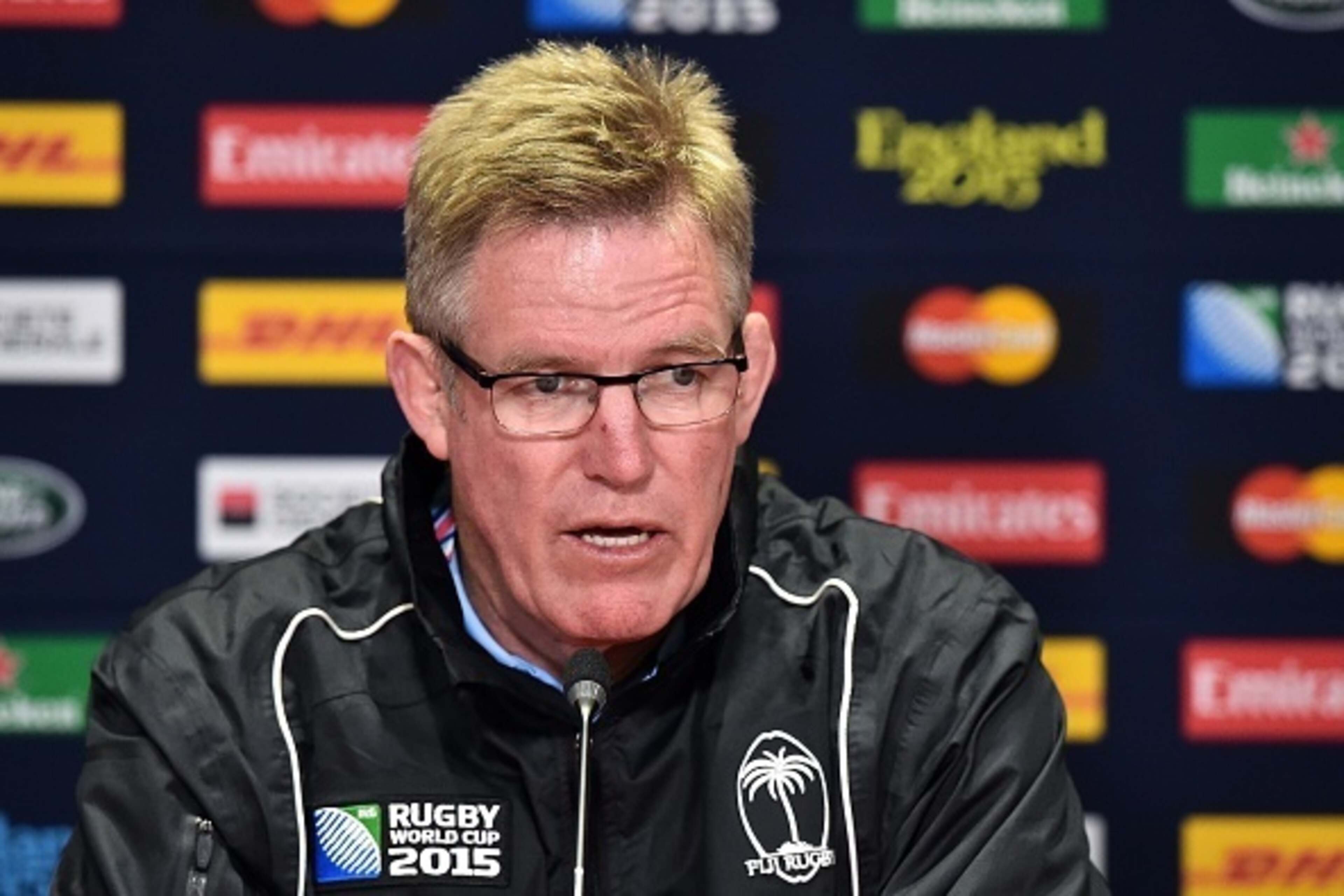 Fiji's New Zealand head coach John McKee attends a press conference in Cardiff, south Wales, on September 30, 2015, during the 2015 Rugby World Cup. AFP PHOTO / GABRIEL BOUYS
RESTRICTED TO EDITORIAL USE (Photo credit should read GABRIEL BOUYS/ Fiji's New Zealand head coach John McKee attends a press conference in Cardiff, south Wales, on September 30, 2015, during the 2015 Rugby World Cup. AFP PHOTO / GABRIEL BOUYS
RESTRICTED TO EDITORIAL USE (Photo credit should read GABRIEL BOUYS/