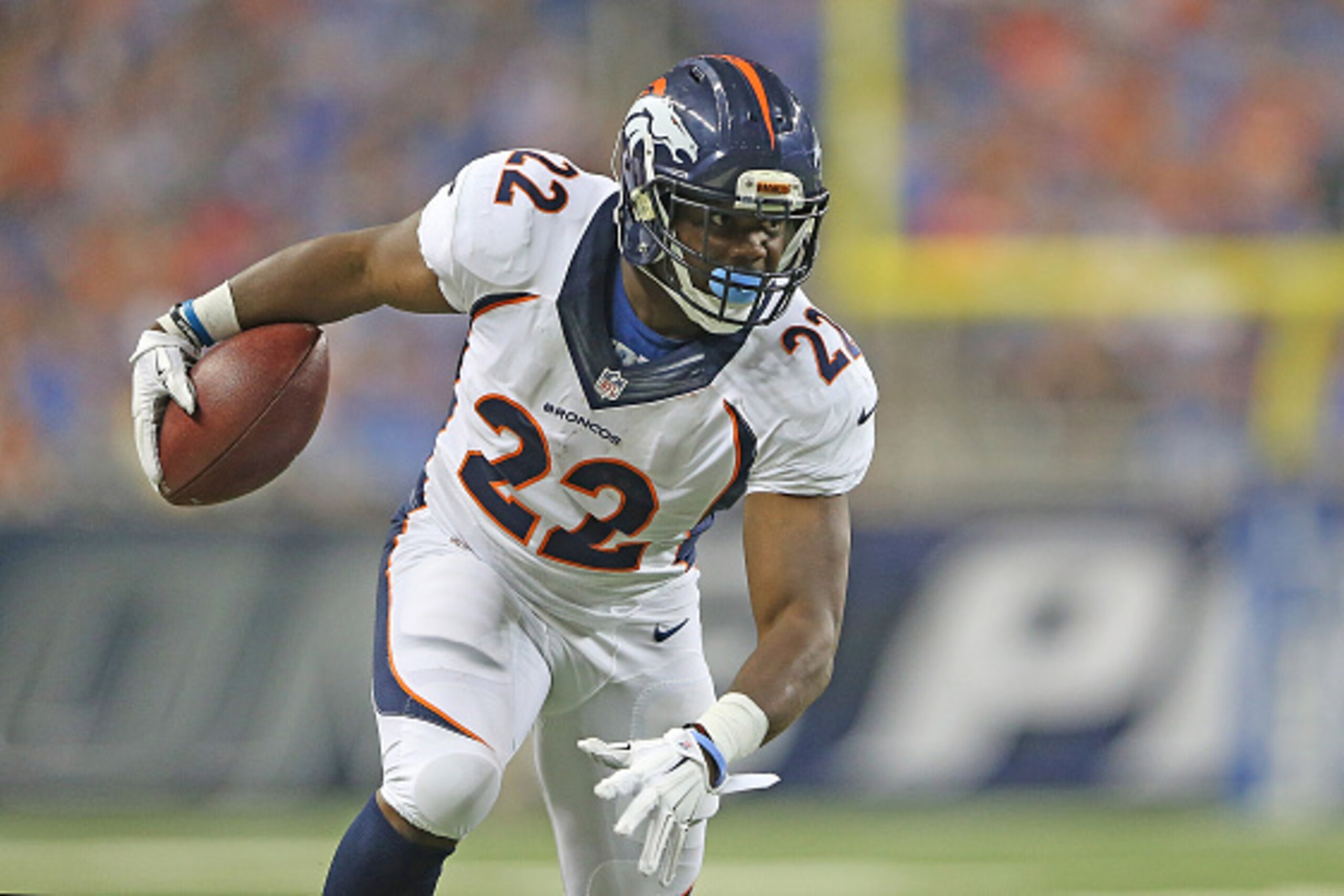 DETROIT, MI - SEPTEMBER 27: C.J. Anderson #22 of the Denver Broncos runs for a first down during the third quarter of the game against the Detroit Lions on September 27, 2015 at Ford Field in Detroit, Michigan. The Broncos defeated the Lions 24-12. (Photo