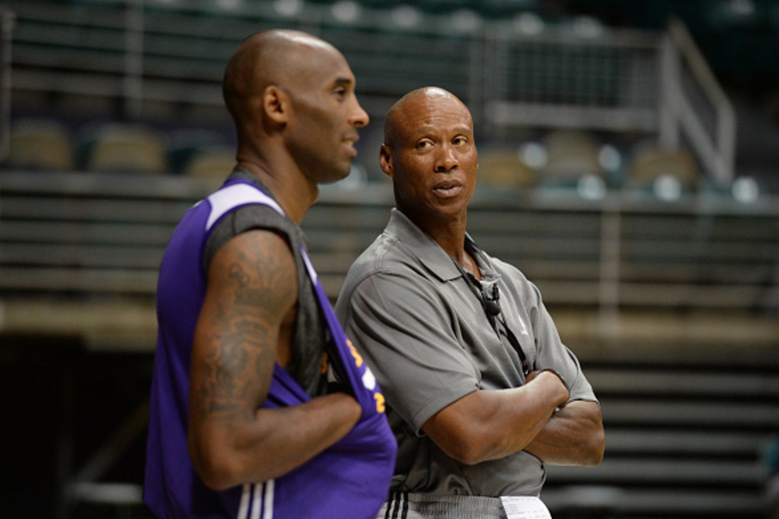 HONOLULU, HI - SEPTEMBER 29: Kobe Bryant chats with Head Coach Byron Scott of the Los Angeles Lakers during training camp on September 29, 2015 at the University of Hawaii, in Honolulu, Hawaii.  NOTE TO USER: User expressly acknowledges and agrees that, b