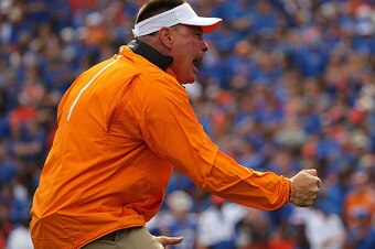 GAINESVILLE, FL - SEPTEMBER 26: Head coach Butch Jones of the Tennessee Volunteers cheers during a game against the Florida Gators at Ben Hill Griffin Stadium on September 26, 2015 in Gainesville, Florida.  (Photo by Mike Ehrmann/Getty Images)