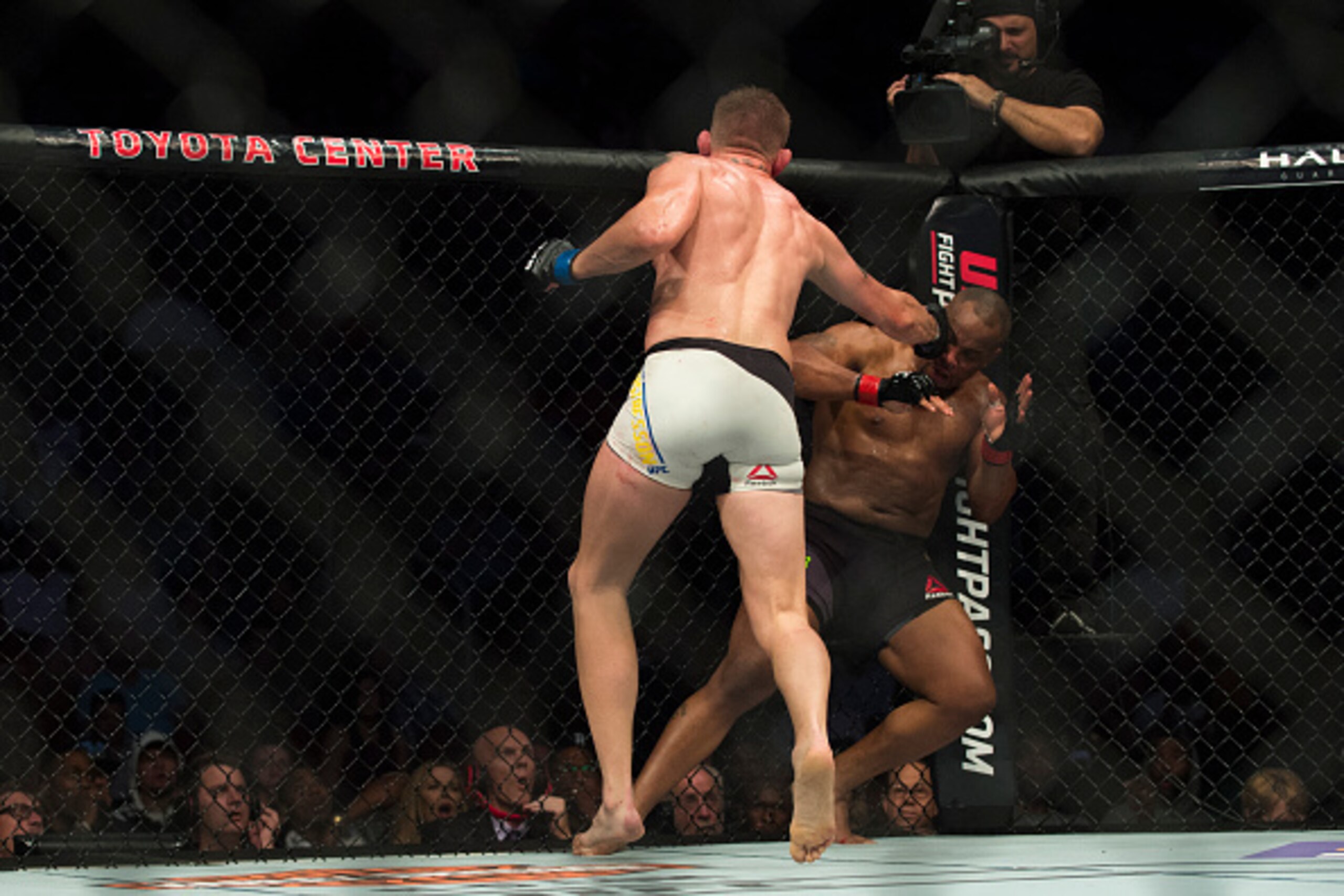 HOUSTON, TX - OCTOBER 3:  Alexander Gustafsson connects with a punch against Daniel Cormier during UFC 192 at the Toyota Center on October 3, 2015 in Houston, Texas. (Photo by Cooper Neill/Zuffa LLC/Zuffa LLC via Getty Images)