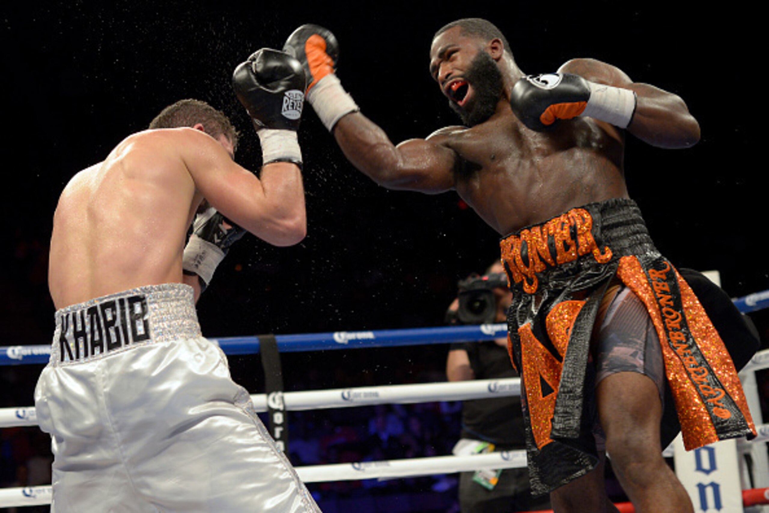 CINCINNATI, OHIO - OCTOBER 03: Adrien Broner, right, takes an uppercut swing at Khabib Allakhverdiev during a fight at U.S. Bank Arena on October 4, 2015 in Cincinnati, Ohio. (Photo by Dylan Buell/Getty Images)
