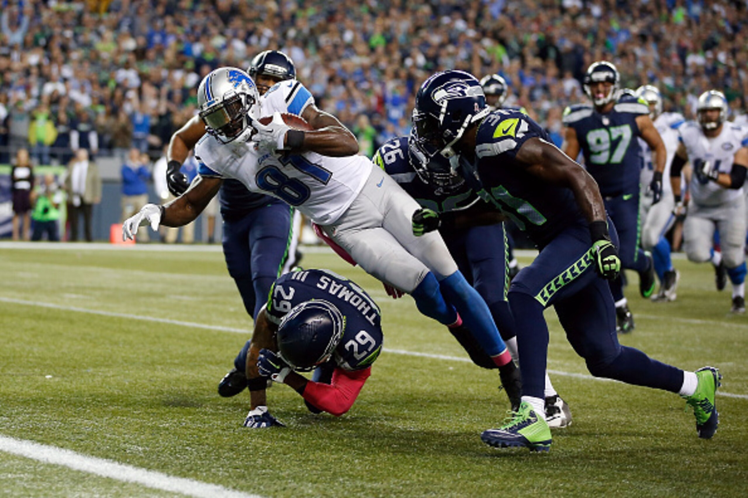 SEATTLE, WA - OCTOBER 05: Calvin Johnson #81 of the Detroit Lions dives for the end zone during the fourth quarter of a game against the Seattle Seahawks at CenturyLink Field on October 5, 2015 in Seattle, Washington. (Photo by Otto Greule Jr/Getty Imag SEATTLE, WA - OCTOBER 05: Calvin Johnson #81 of the Detroit Lions dives for the end zone during the fourth quarter of a game against the Seattle Seahawks at CenturyLink Field on October 5, 2015 in Seattle, Washington. (Photo by Otto Greule Jr/Getty Imag