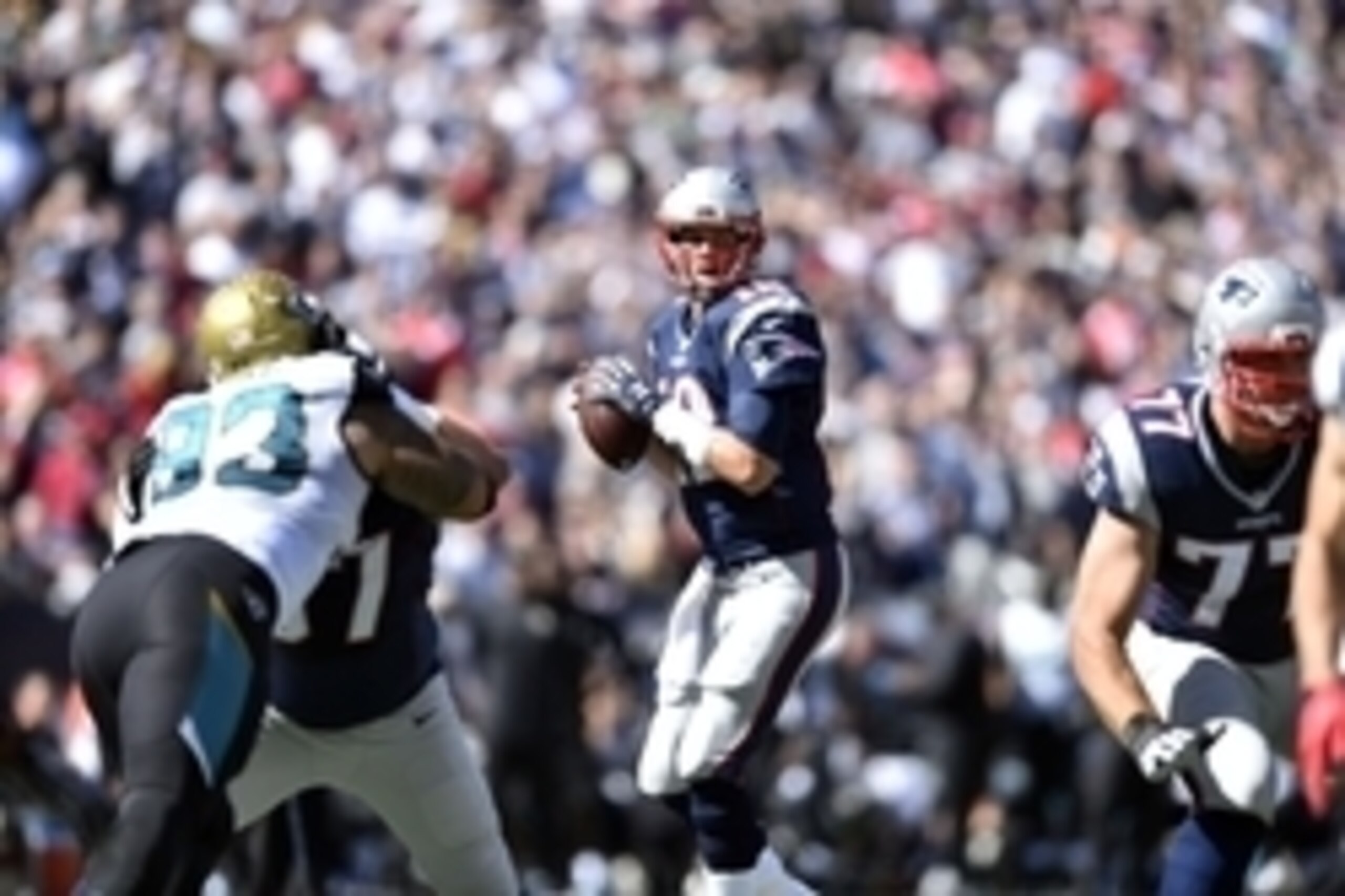 Sep 27, 2015; Foxborough, MA, USA; New England Patriots quarterback Tom Brady (12) looks to pass in the first quarter against the Jacksonville Jaguars at Gillette Stadium. New England defeated Jacksonville 51-17.  Mandatory Credit: James Lang-USA TODAY Sp