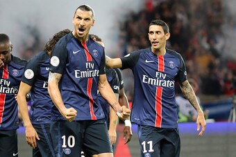 PARIS, FRANCE - OCTOBER 4: Zlatan Ibrahimovic of PSG (left) celebrates his goal with Angel Di Maria of PSG during the French Ligue 1 match between Paris Saint-Germain FC (PSG) and Olympique de Marseille at Parc des Princes stadium on October 4, 2015 in Pa