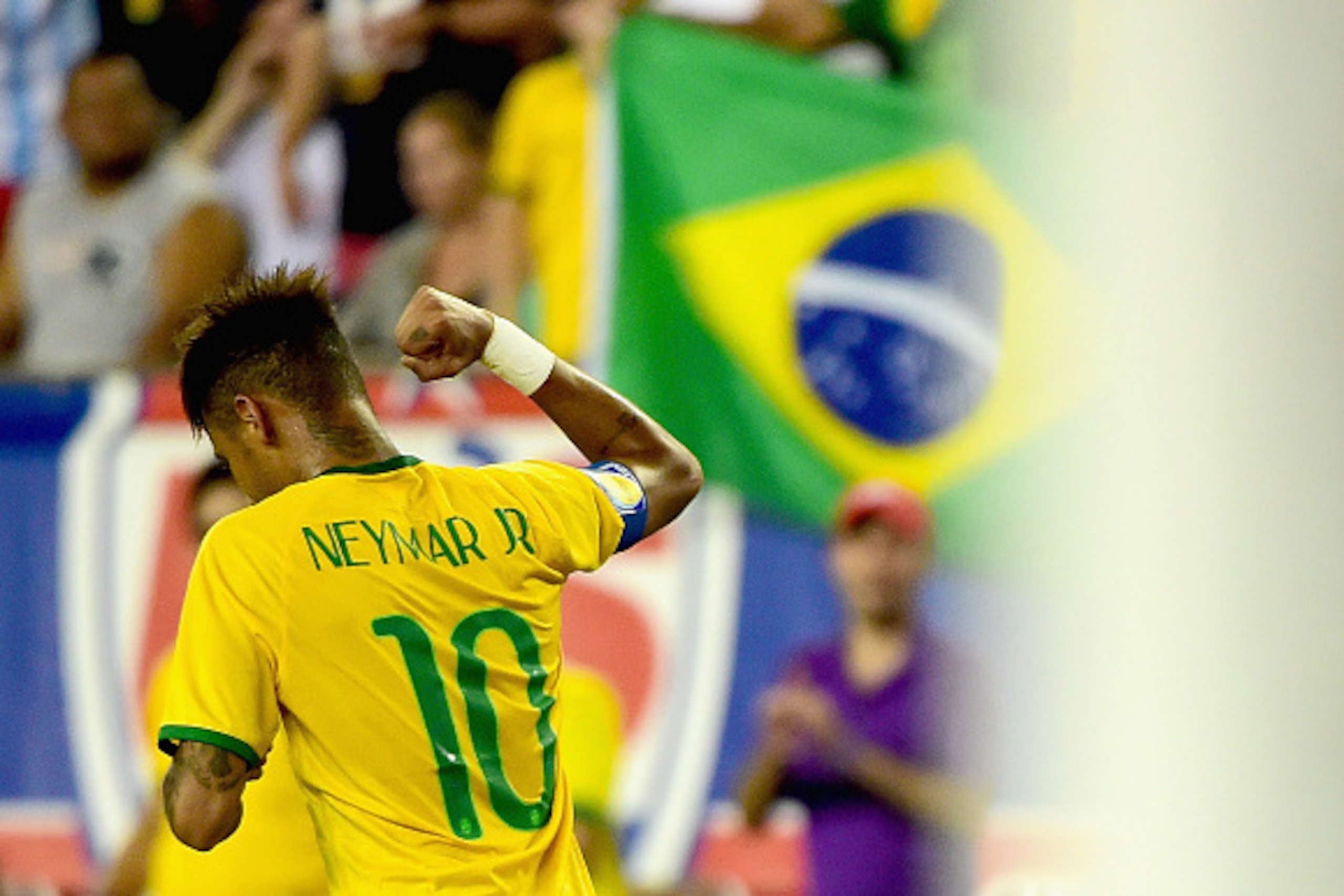 FOXBORO, MA - SEPTEMBER 08:  Neymar #10 of Brazil reacts after scoring a goal during an international friendly against the United States at Gillette Stadium on September 8, 2015 in Foxboro, Massachusetts.  (Photo by Billie Weiss/Getty Images)