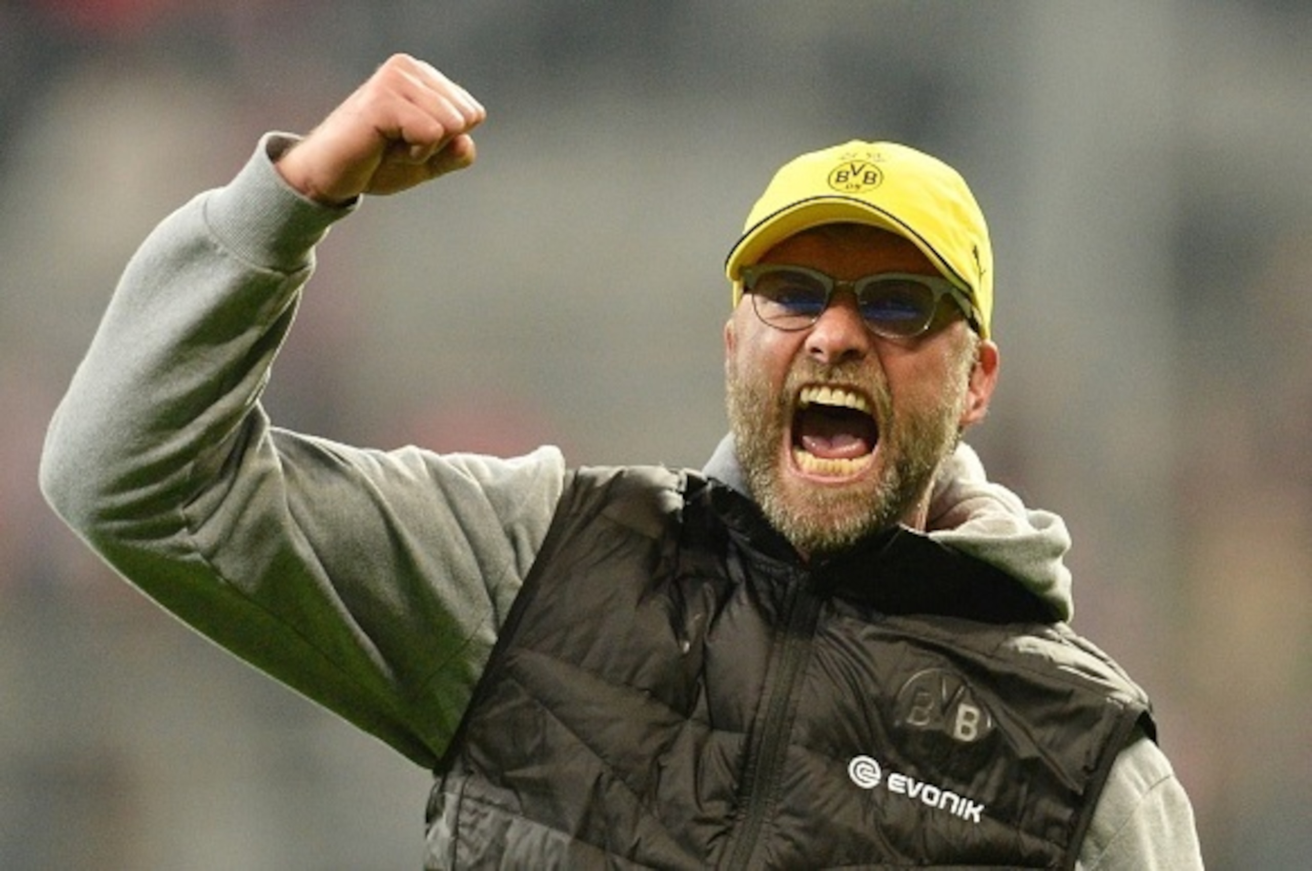 Dortmund's headcoach Juergen Klopp celebrates after the German Cup DFB Pokal semi-final football match FC Bayern Munich v Borussia Dortmund in Munich, southern Germany, on April 28, 2015. Dortmund won the match 1-3 after penalties. AFP PHOTO / CHRISTOF ST