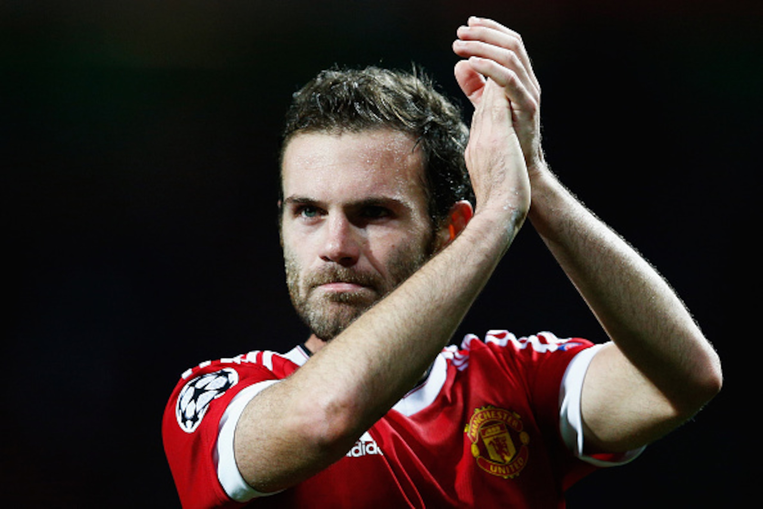 MANCHESTER, ENGLAND - SEPTEMBER 30:  Juan Mata of Manchester United applauds the crowd after victory in the UEFA Champions League Group B match between Manchester United FC and VfL Wolfsburg at Old Trafford on September 30, 2015 in Manchester, United King