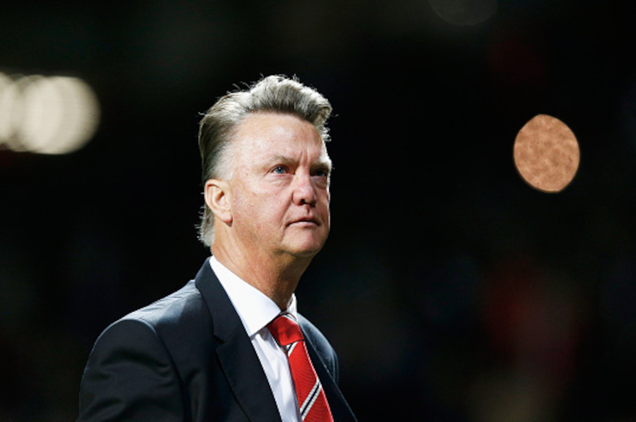 MANCHESTER, ENGLAND - SEPTEMBER 30:  Louis van Gaal Manager of Manchester United looks to the crowd after victory in the UEFA Champions League Group B match between Manchester United FC and VfL Wolfsburg at Old Trafford on September 30, 2015 in Manchester