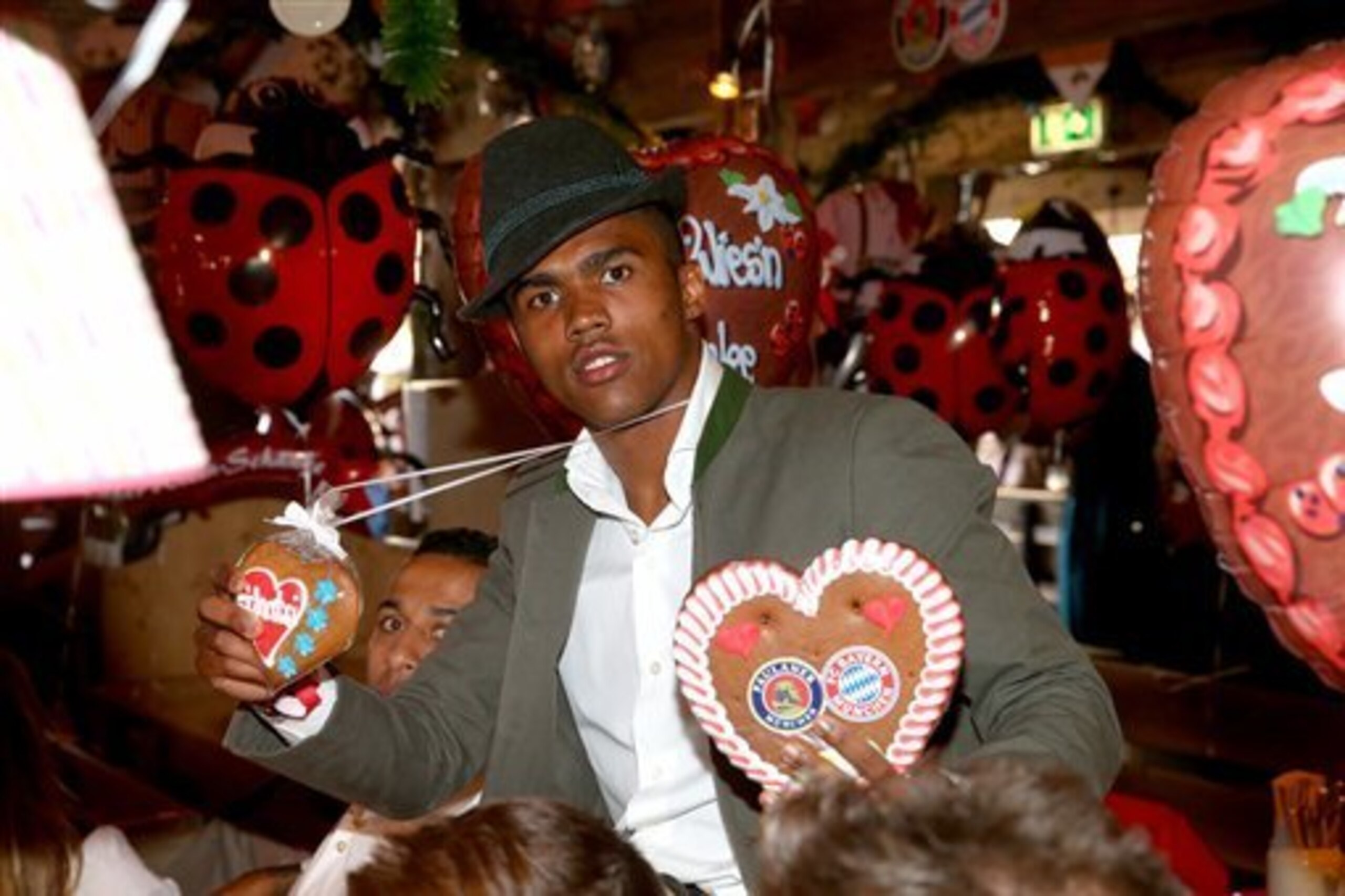 Douglas Costa, here celebrating Oktoberfest with his teammates, has quickly settled into life in Munich Douglas Costa, here celebrating Oktoberfest with his teammates, has quickly settled into life in Munich