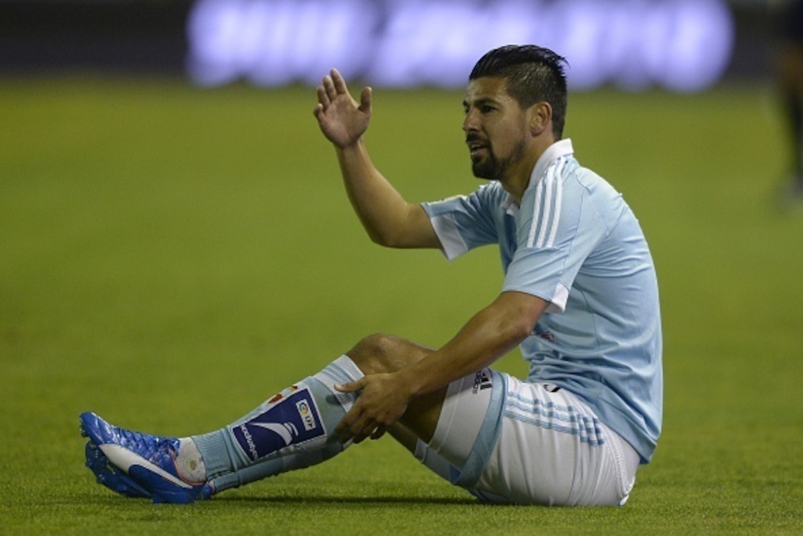 Celta Vigo's forward Nolito sits on the field during the Spanish league football match Celta Vigo vs Getafe CF at the Balaidos stadium in Vigo on October 2, 2015. AFP PHOTO / MIGUEL RIOPA (Photo credit should read MIGUEL RIOPA/AFP/Getty Images) Celta Vigo's forward Nolito sits on the field during the Spanish league football match Celta Vigo vs Getafe CF at the Balaidos stadium in Vigo on October 2, 2015. AFP PHOTO / MIGUEL RIOPA (Photo credit should read MIGUEL RIOPA/AFP/Getty Images)