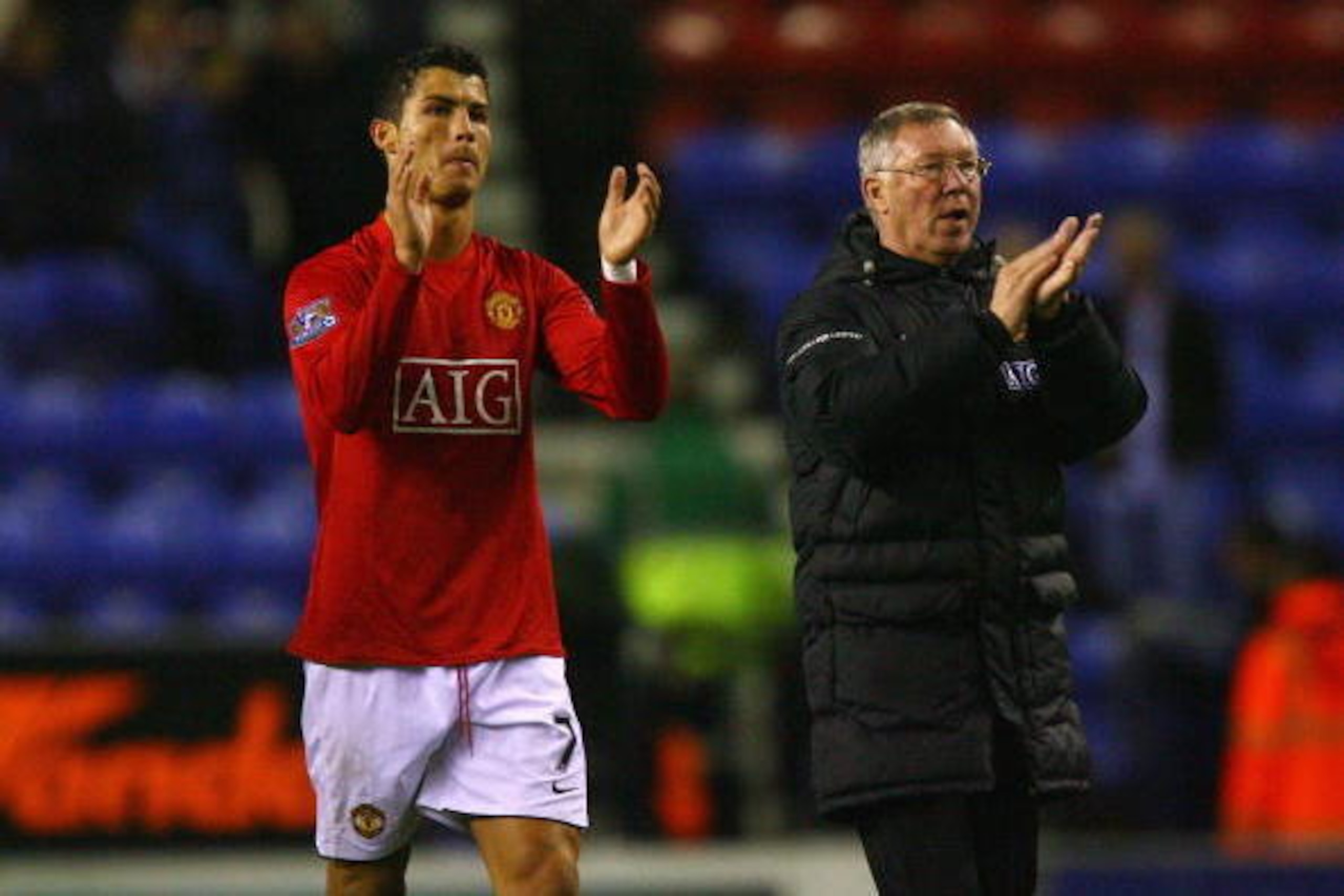 WIGAN, ENGLAND - MAY 13:  Sir Alex Ferguson the manager of Manchester United and Cristiano Ronaldo celebrate after the Barclays Premier League match between Wigan Athletic and Manchester United at the JJB Stadium on May 13, 2009 in Wigan, England.  (Photo