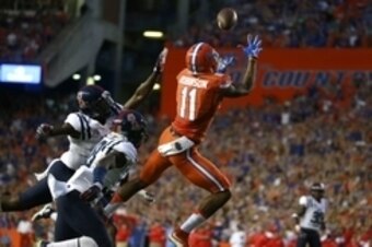 Oct 3, 2015; Gainesville, FL, USA; Florida Gators wide receiver Demarcus Robinson (11) catches the ball for a touchdown over Mississippi Rebels defensive back Mike Hilton (38) during the first quarter at Ben Hill Griffin Stadium. Mandatory Credit: Kim Kle