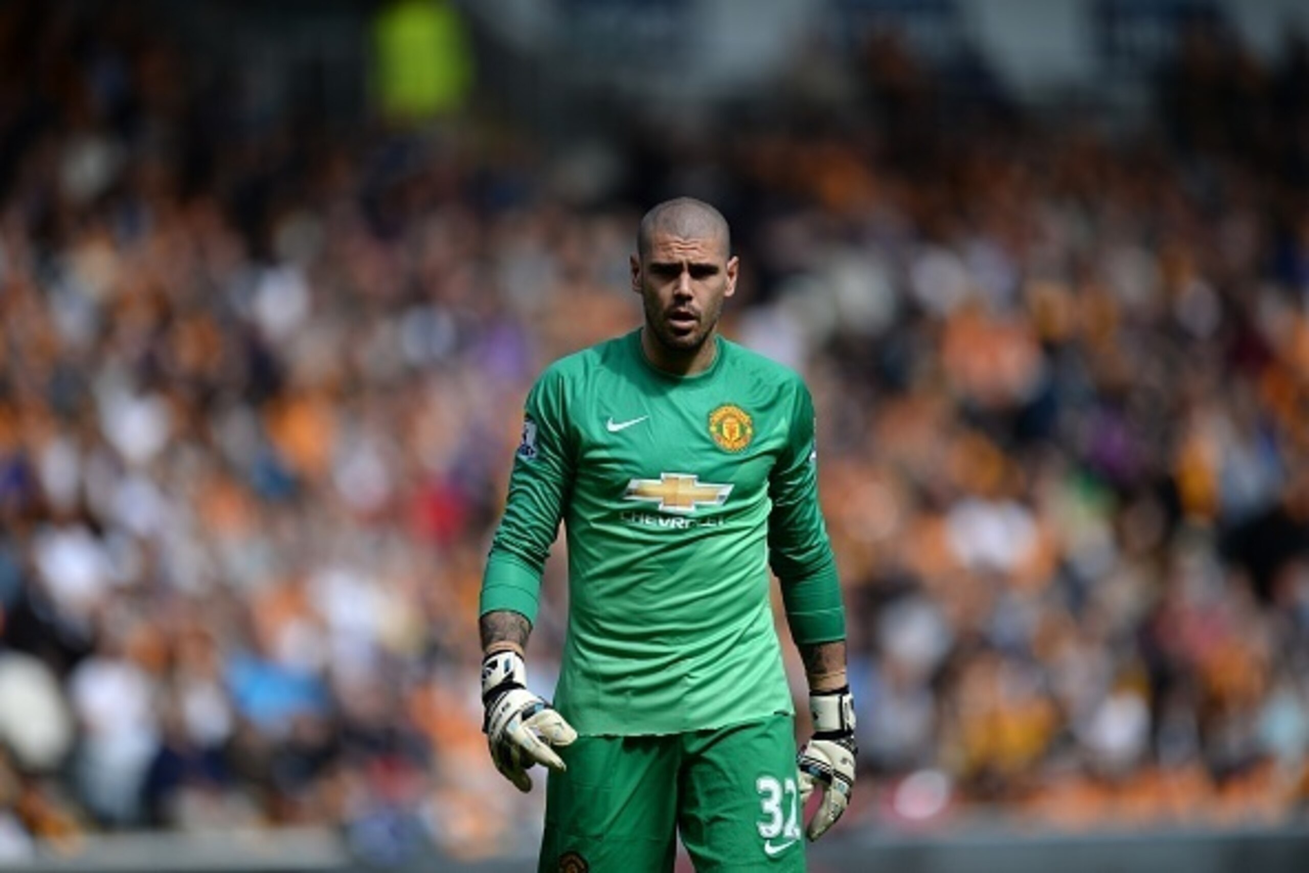 Manchester United's Spanish goalkeeper Victor Valdes plays during the English Premier League football match between Hull City and Manchester United at the KC Stadium in Kingston upon Hull, north east England on May 24, 2015.  AFP PHOTO / OLI SCARFF

RESTR