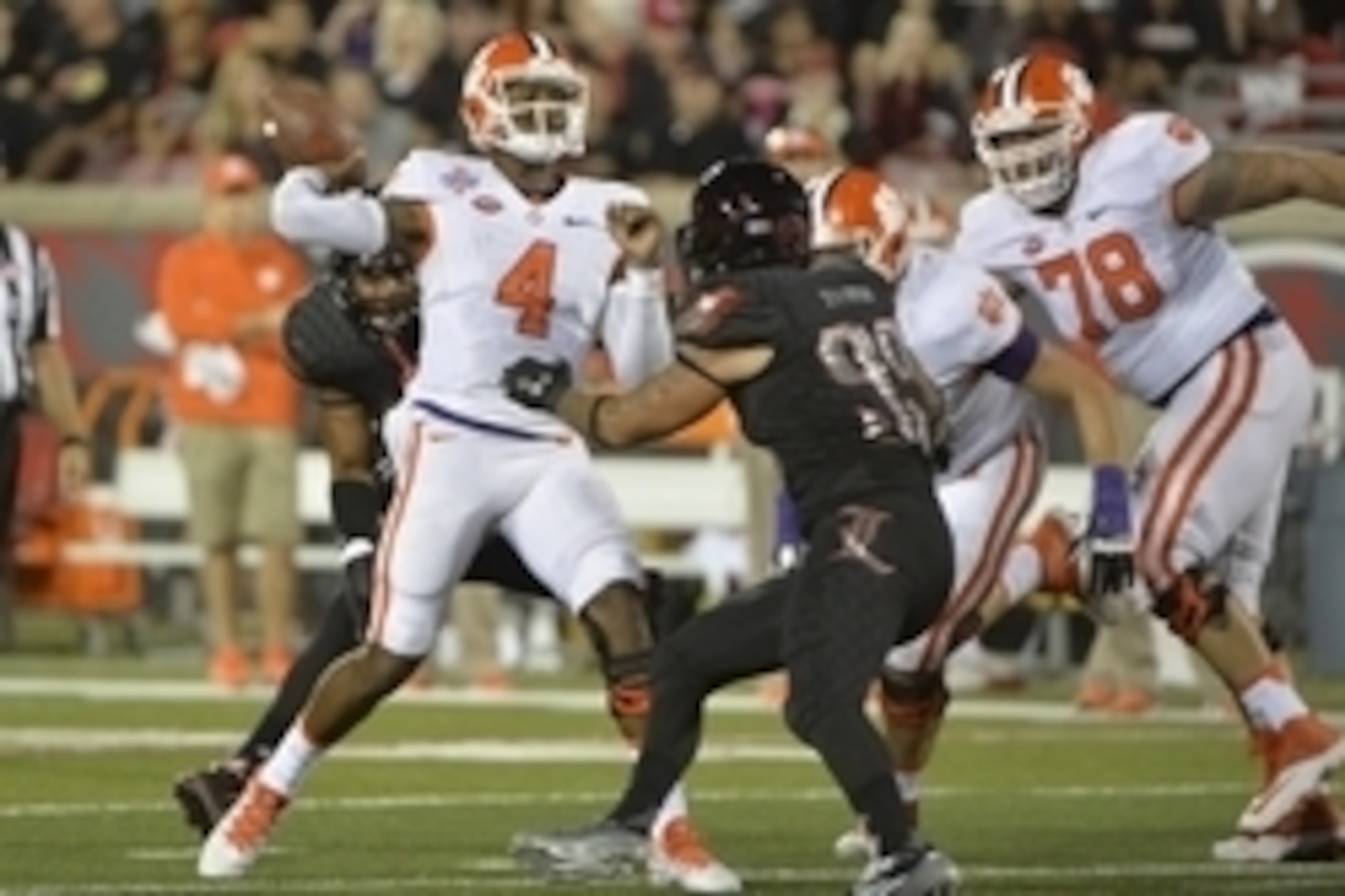 Sep 17, 2015; Louisville, KY, USA; Clemson Tigers quarterback Deshaun Watson (4) looks to throw against the Louisville Cardinals during the second quarter at Papa John's Cardinal Stadium. Mandatory Credit: Jamie Rhodes-USA TODAY Sports