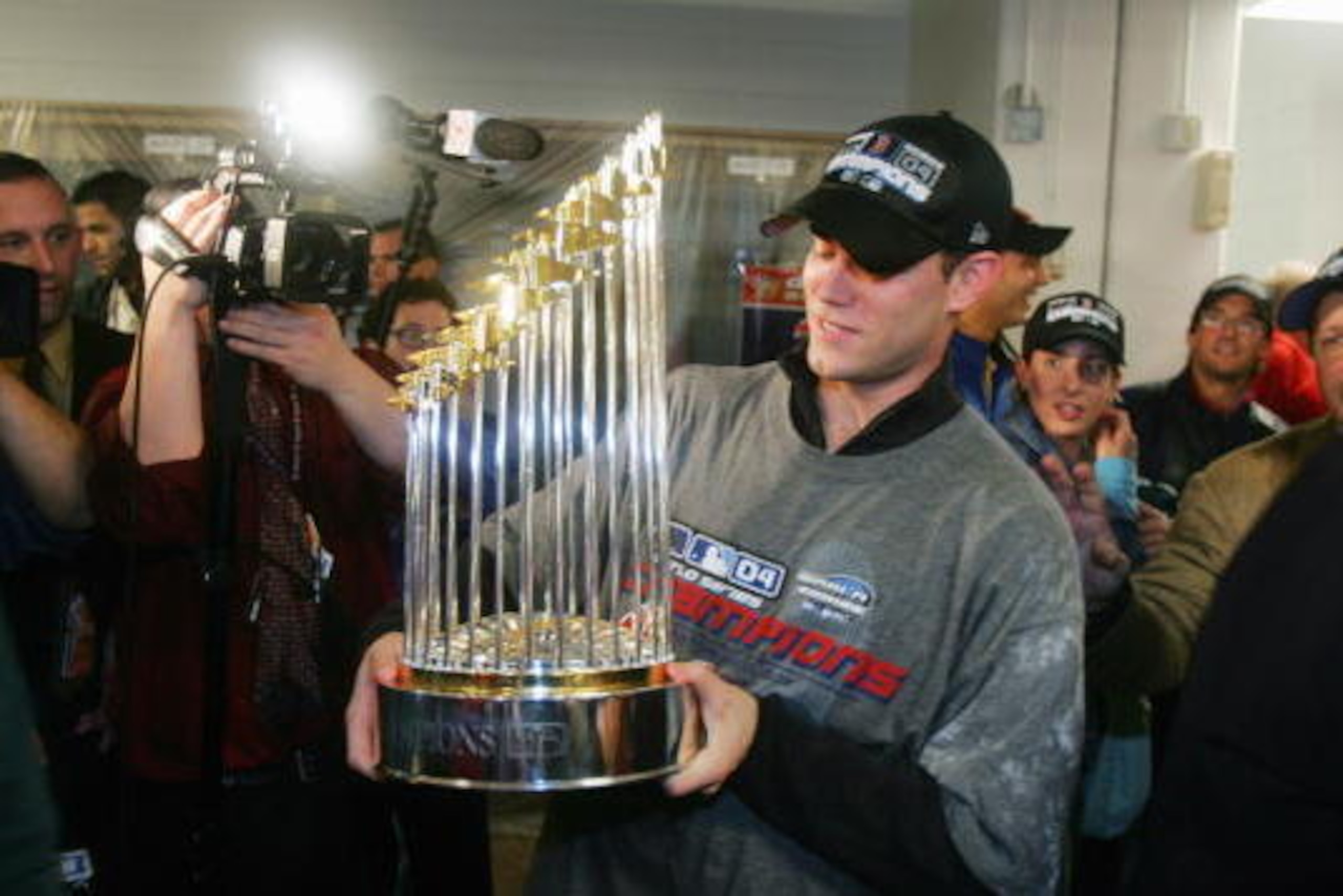 ST. LOUIS - OCTOBER 27: General Manager Theo Epstein of the Boston Red Sox celebrates after winning game four of the 2004 World Series against the St. Louis Cardinals at Busch Stadium on October 27, 2004 in St. Louis, Missouri. The Red Sox defeated the C ST. LOUIS - OCTOBER 27: General Manager Theo Epstein of the Boston Red Sox celebrates after winning game four of the 2004 World Series against the St. Louis Cardinals at Busch Stadium on October 27, 2004 in St. Louis, Missouri. The Red Sox defeated the C