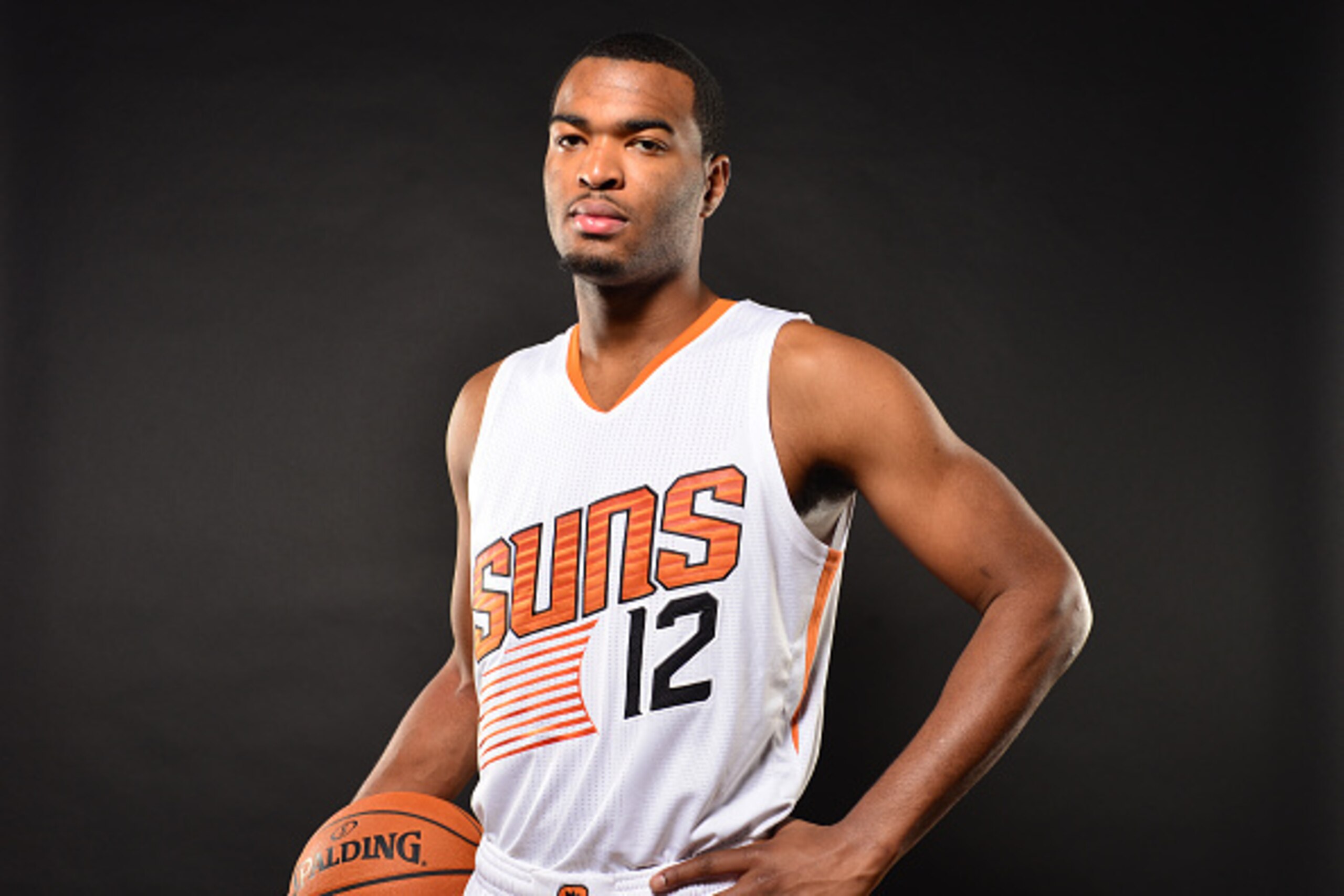 PHOENIX, AZ - SEPTEMBER 28: T.J. Warren #12 of the Phoenix Suns poses for Media Day on September 28, 2015 at the Talking Stick Resort Arena in Phoenix, Arizona. NOTE TO USER: User expressly acknowledges and agrees that, by downloading and or using this Ph