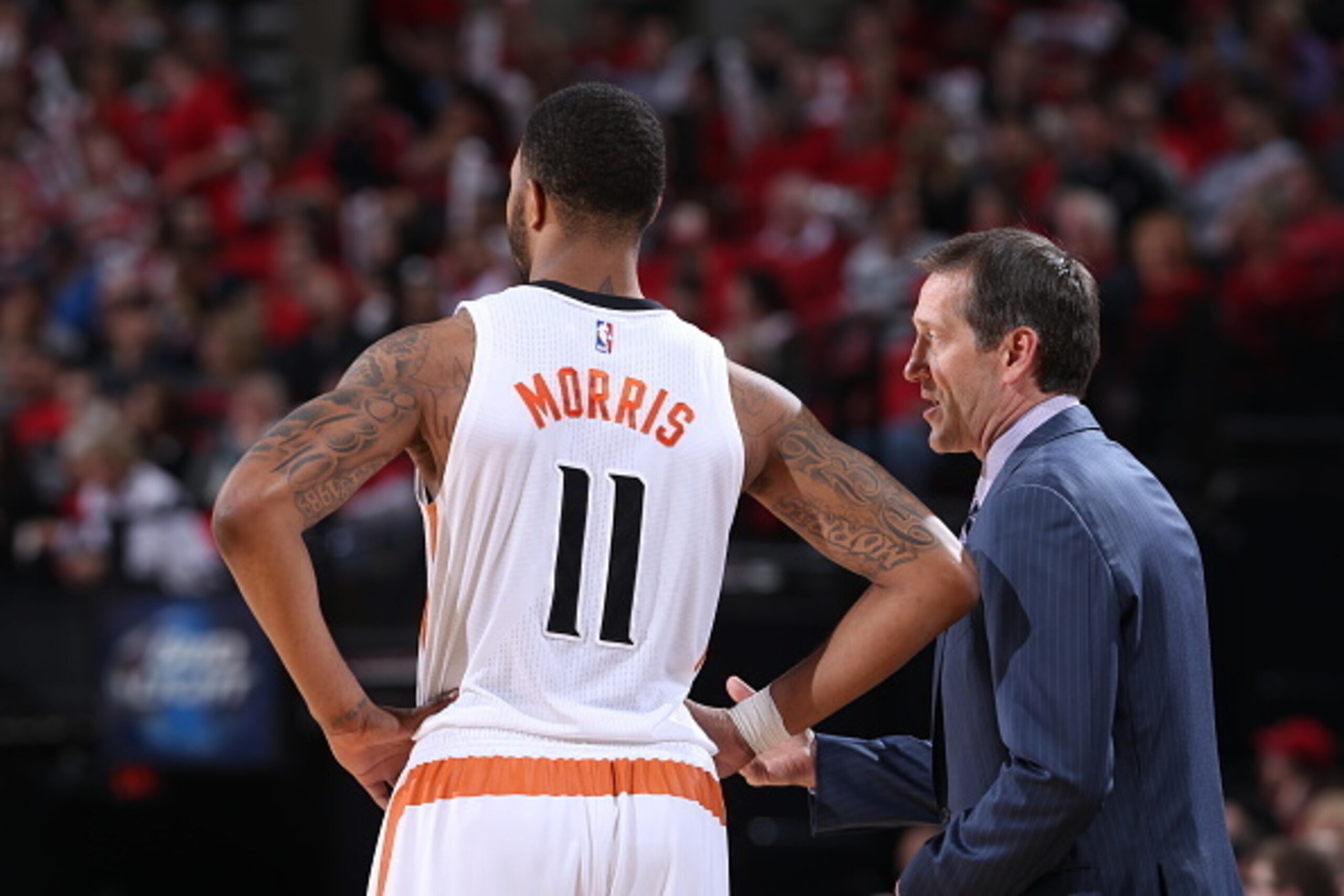 PORTLAND, OR - FEBRUARY 5: Markieff Morris #11 and Jeff Hornacek of the Phoenix Suns speak during a game against the Portland Trail Blazers on February 5, 2015 at the Moda Center Arena in Portland, Oregon. NOTE TO USER: User expressly acknowledges and agr