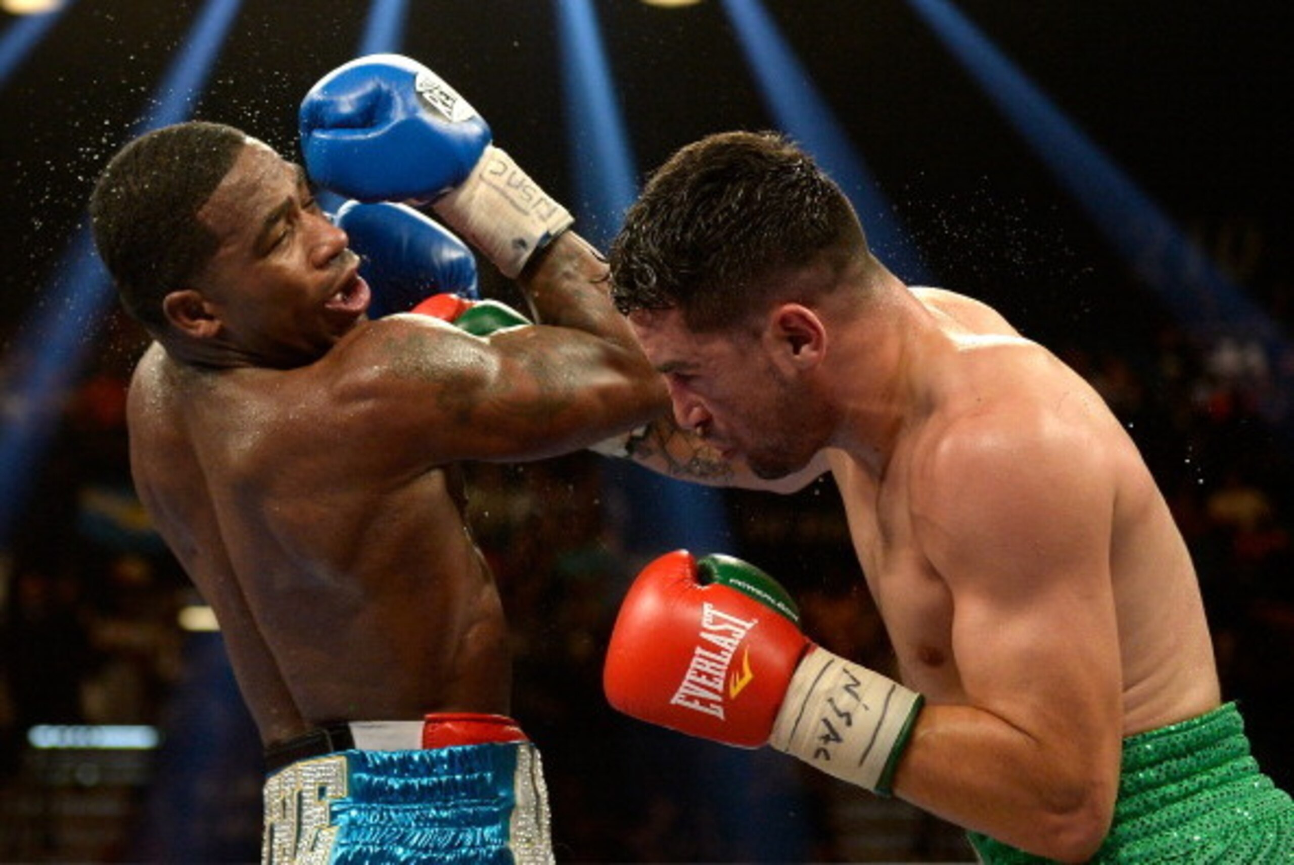 LAS VEGAS, NV - MAY 03: Adrien Broner punches Carlos Molina during their super lightweight bout at the MGM Grand Garden Arena on May 3, 2014 in Las Vegas, Nevada. Broner won by unanimous decision. (Photo by Harry How/Getty Images) LAS VEGAS, NV - MAY 03: Adrien Broner punches Carlos Molina during their super lightweight bout at the MGM Grand Garden Arena on May 3, 2014 in Las Vegas, Nevada. Broner won by unanimous decision. (Photo by Harry How/Getty Images)