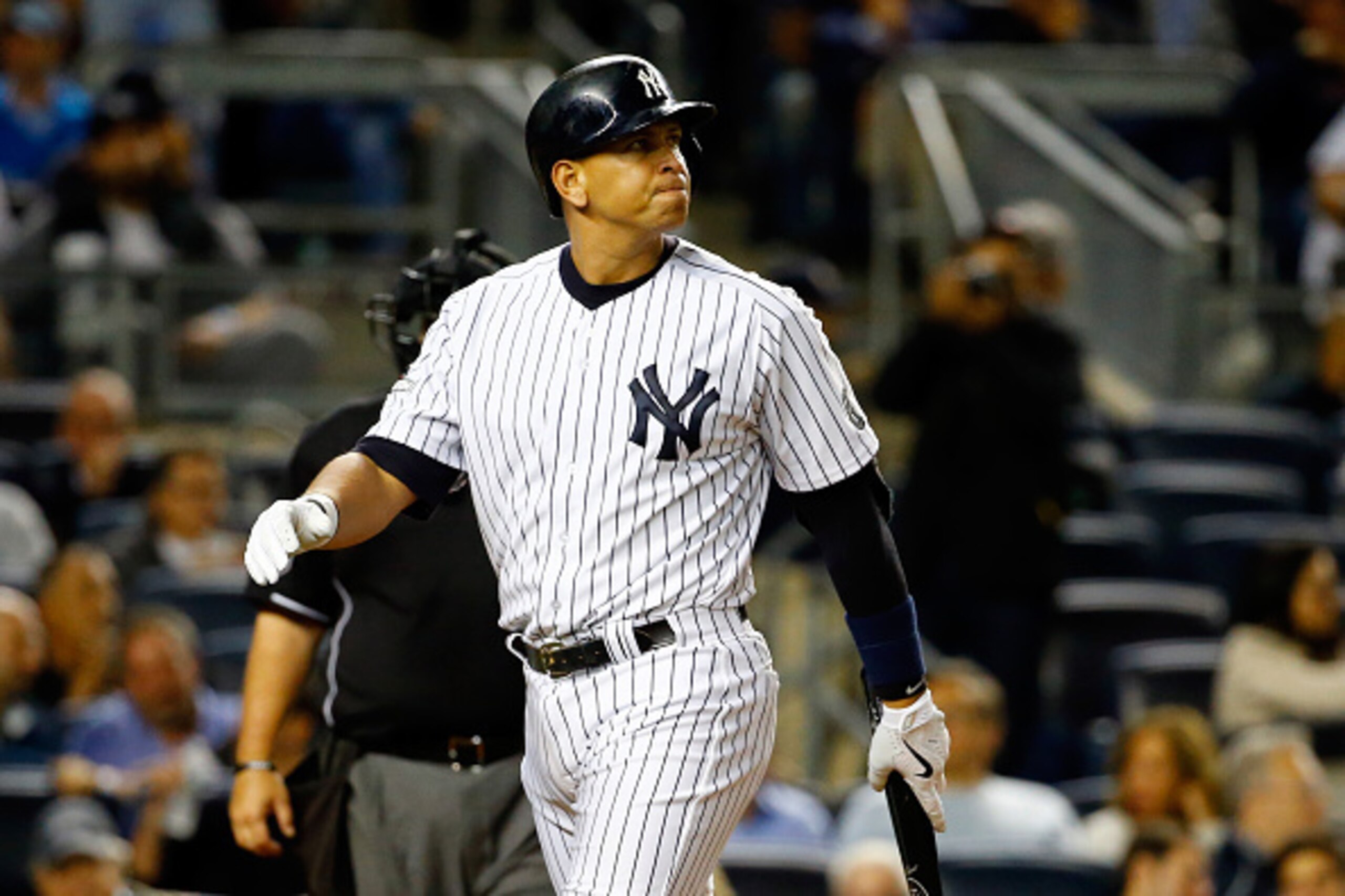 NEW YORK, NY - OCTOBER 06:  Alex Rodriguez #13 of the New York Yankees looks on after being struck out in the ninth inning against Luke Gregerson #44 of the Houston Astros during the American League Wild Card Game at Yankee Stadium on October 6, 2015 in N