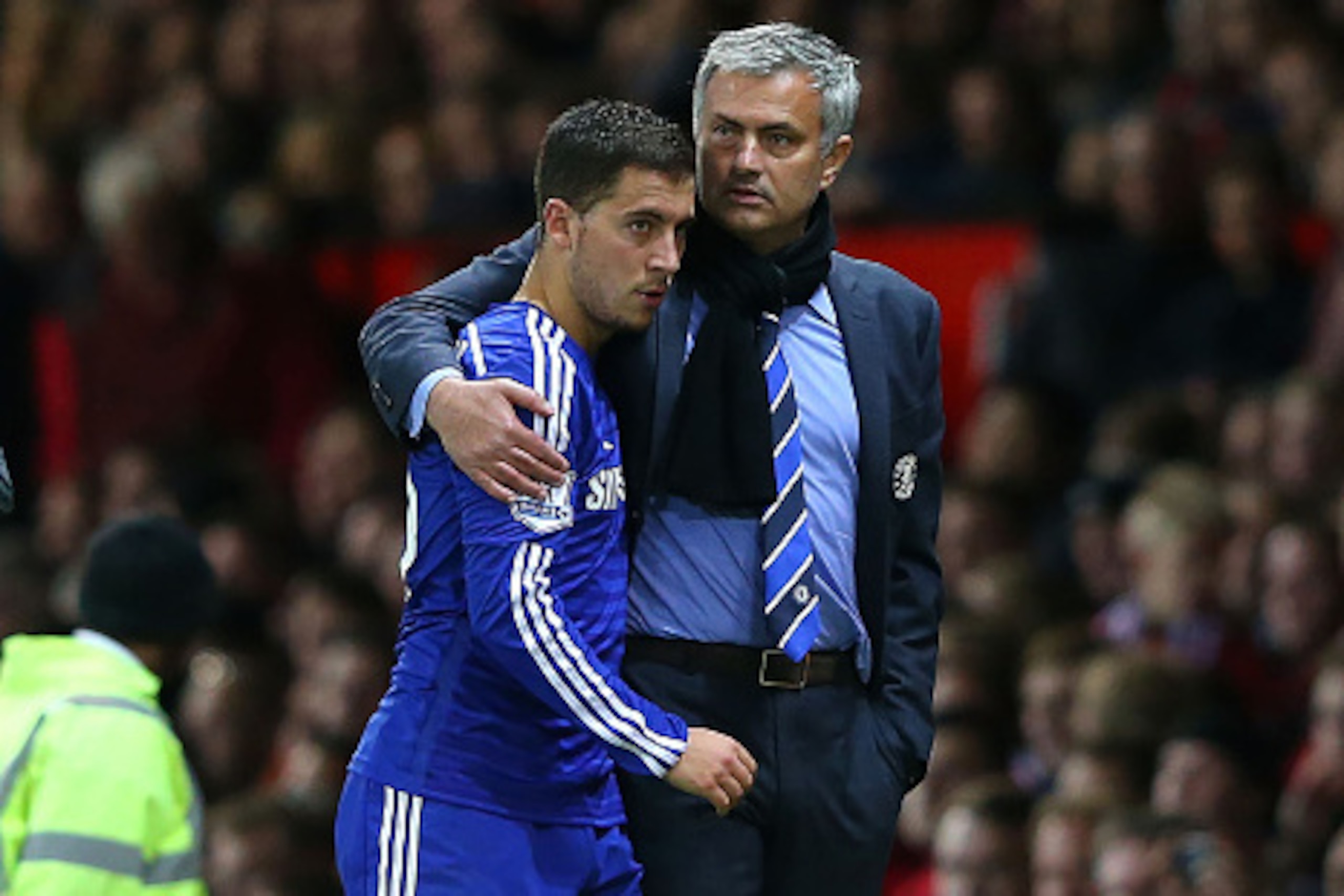 MANCHESTER, ENGLAND - OCTOBER 26:  Chelsea Manager Jose Mourinho embraces Eden Hazard during the Barclays Premier League match between Manchester United and Chelsea at Old Trafford on October 26, 2014 in Manchester, England.  (Photo by Alex Livesey/Getty 