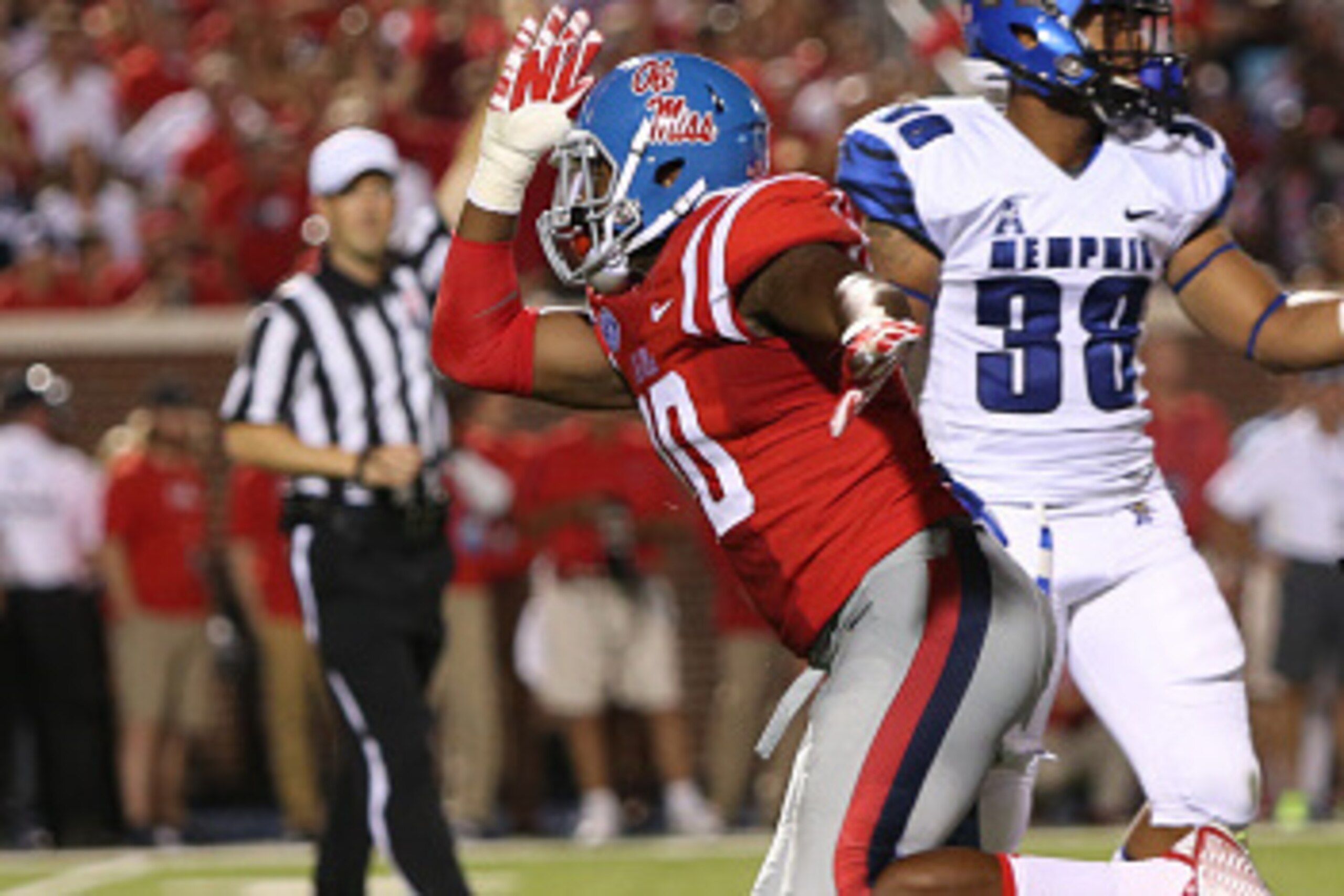 OXFORD, MS - SEPTEMBER 27: C.J. Johnson #10 of the Ole Miss Rebels celebrates after a play against the Memphis Tigers on September 27, 2014 at Vaught-Hemingway Stadium in Oxford, Mississippi. (Photo by Joe Murphy/Getty Images) OXFORD, MS - SEPTEMBER 27: C.J. Johnson #10 of the Ole Miss Rebels celebrates after a play against the Memphis Tigers on September 27, 2014 at Vaught-Hemingway Stadium in Oxford, Mississippi. (Photo by Joe Murphy/Getty Images)