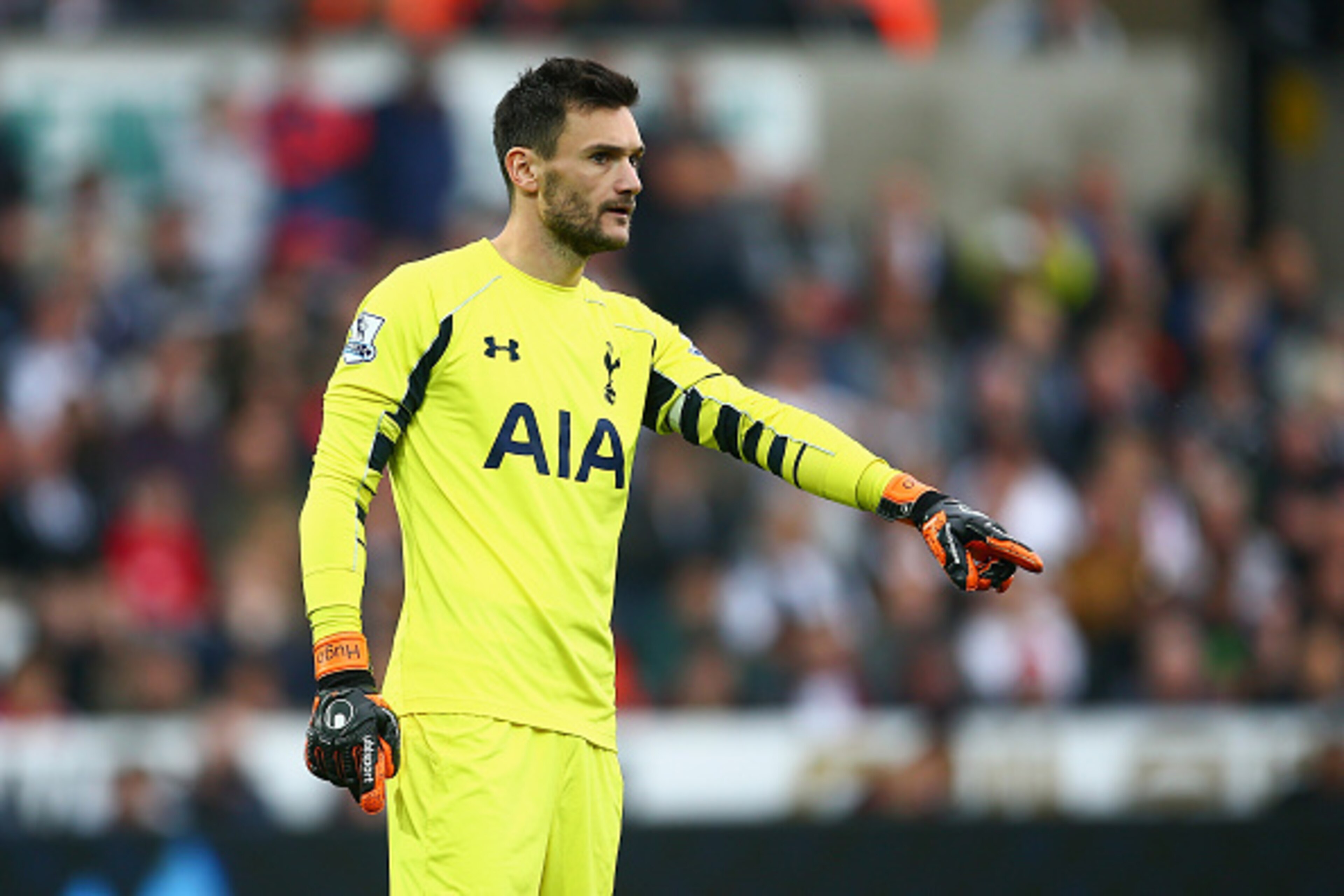 SWANSEA, WALES - OCTOBER 04: Hugo Lloris of Tottenham Hotspur makes a point during the Barclays Premier League match between Swansea City and Tottenham Hotspur at Liberty Stadium on October 4, 2015 in Swansea, Wales.  (Photo by Jordan Mansfield/Getty Imag