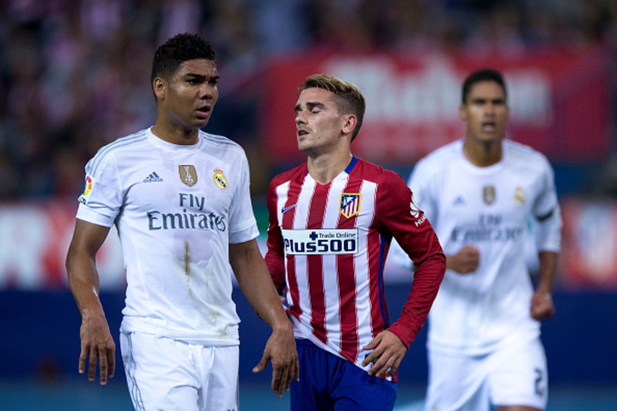 MADRID, SPAIN - OCTOBER 04: Antoine Griezmann (2ndL) of Atletico de Madrid reacts as he fail to score surrounded by Gabi Fernandez (L) of Real Madrid CF and his teammate Raphael Varane (R) during the La Liga match between Club Atletico de Madrid and Real 