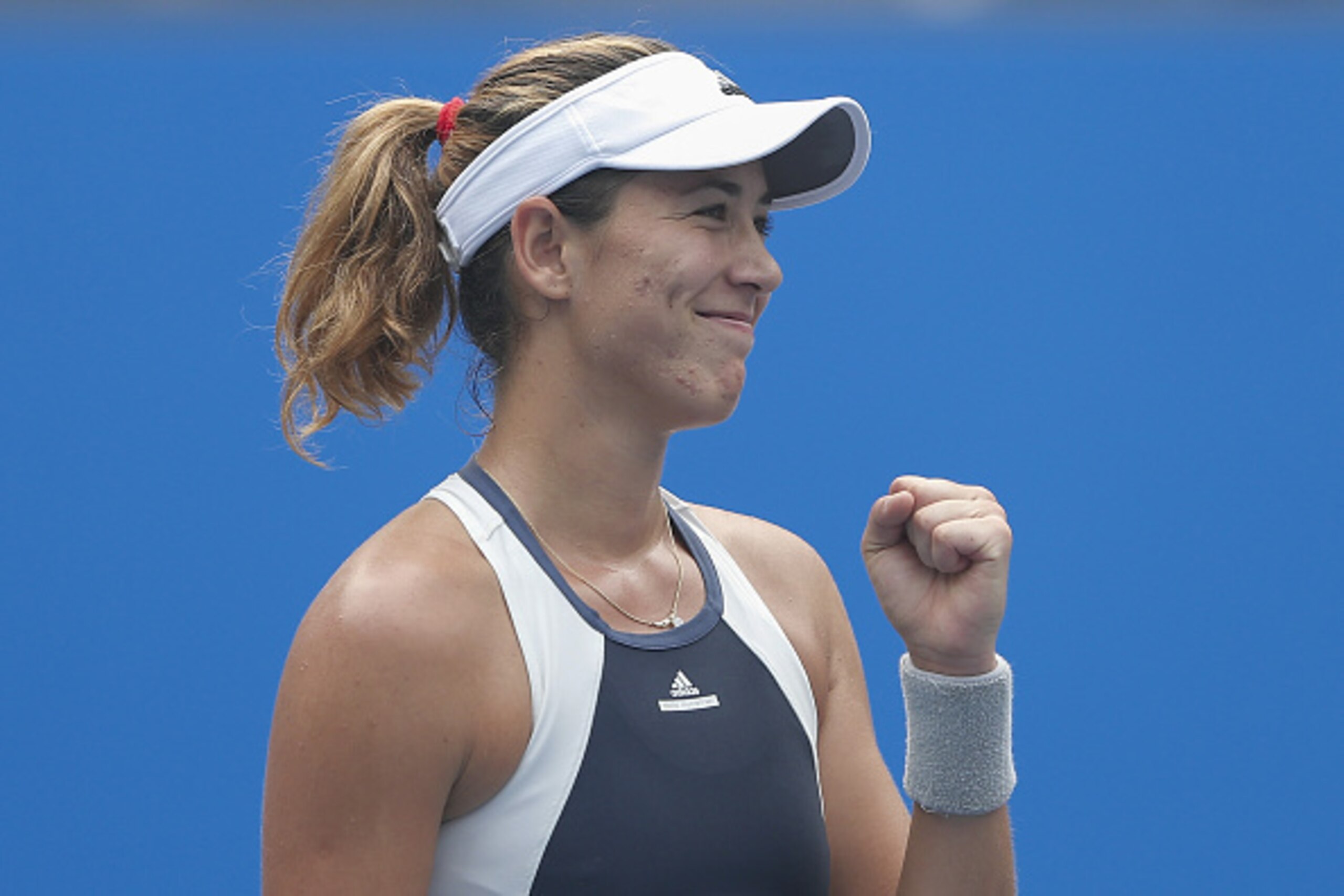 BEIJING, CHINA - OCTOBER 07:  Garbine Muguruza of Spain celebrates after winning the match against Irina Falconi of the United States during the Women's singles Second round match on day five of the 2015 China Open at the China National Tennis Centre on O
