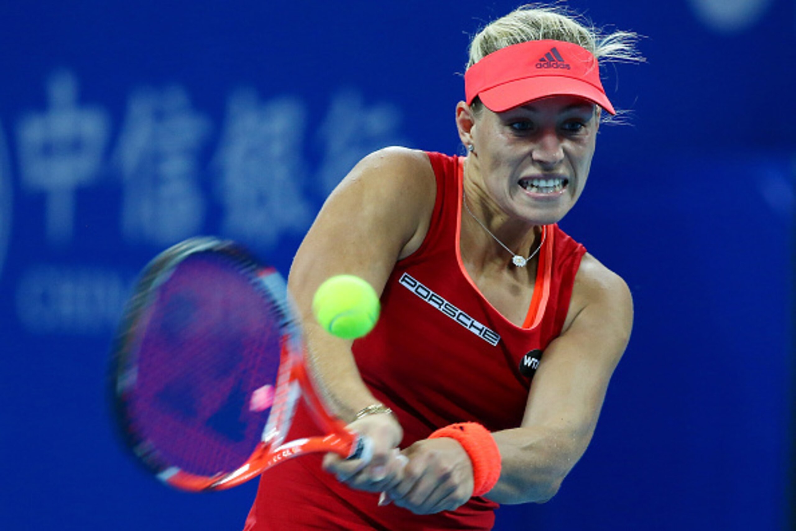 BEIJING, CHINA - OCTOBER 07:  Angelique Kerber of Germany plays a backhand in her match against Caroline Wozniacki of Denmark on day 5 of the 2015 China Open at the National Tennis Centre on October 7, 2015 in Beijing, China.  (Photo by Chris Hyde/Getty I
