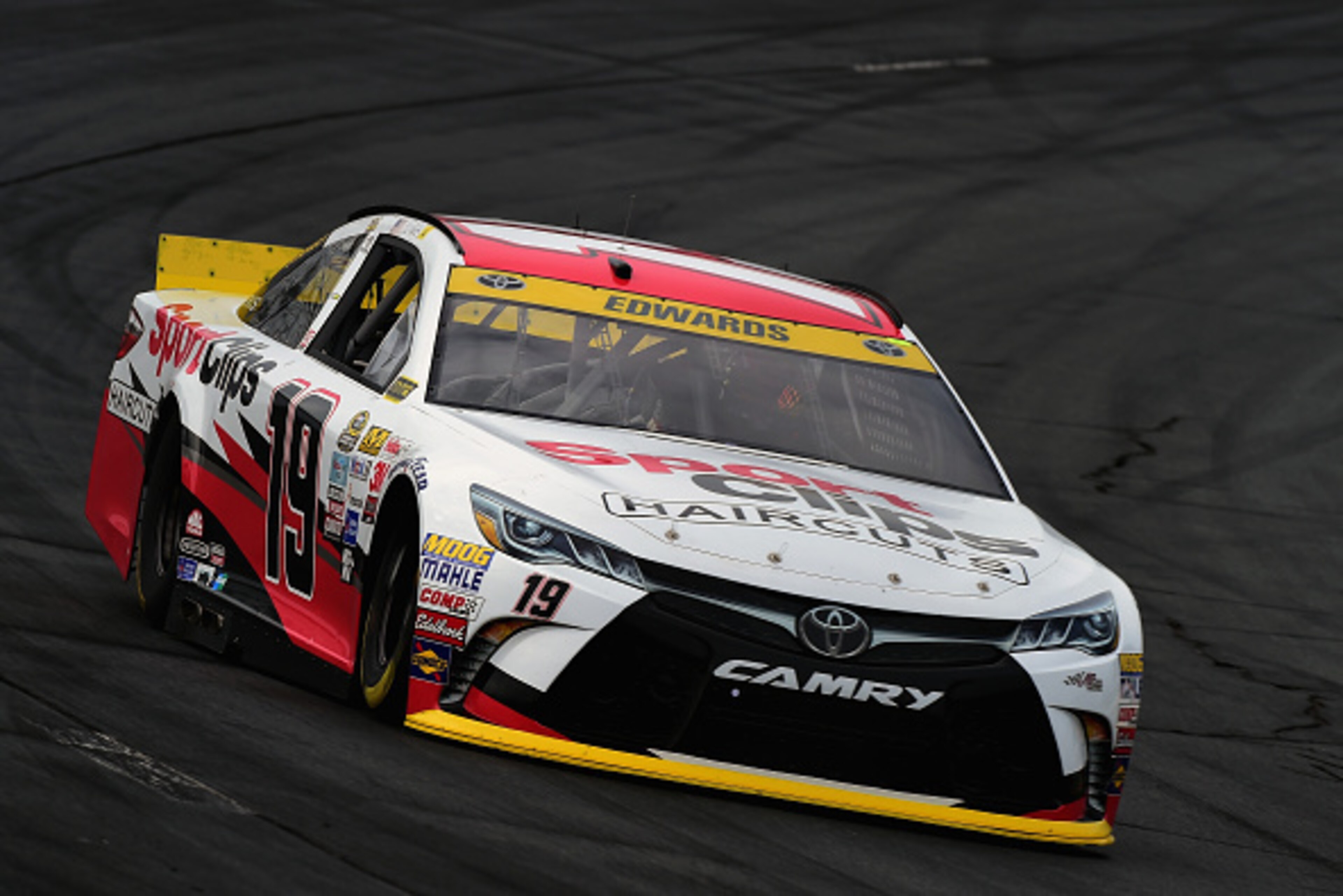 LOUDON, NH - SEPTEMBER 25:  Carl Edwards, driver of the #19 Sport Clips Toyota, practices for the NASCAR Sprint Cup Series Sylvania 300 at New Hampshire Motor Speedway on September 25, 2015 in Loudon, New Hampshire.  (Photo by Jared C. Tilton/Getty Images