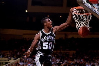 NEW YORK - 1989:  David Robinson #50 of the San Antonio Spurs goes up for a slam dunk against the New York Knicks during an NBA game in 1989 at Madison Square Garden in New York, New York.  NOTE TO USER: User expressly acknowledges and agrees that, by dow