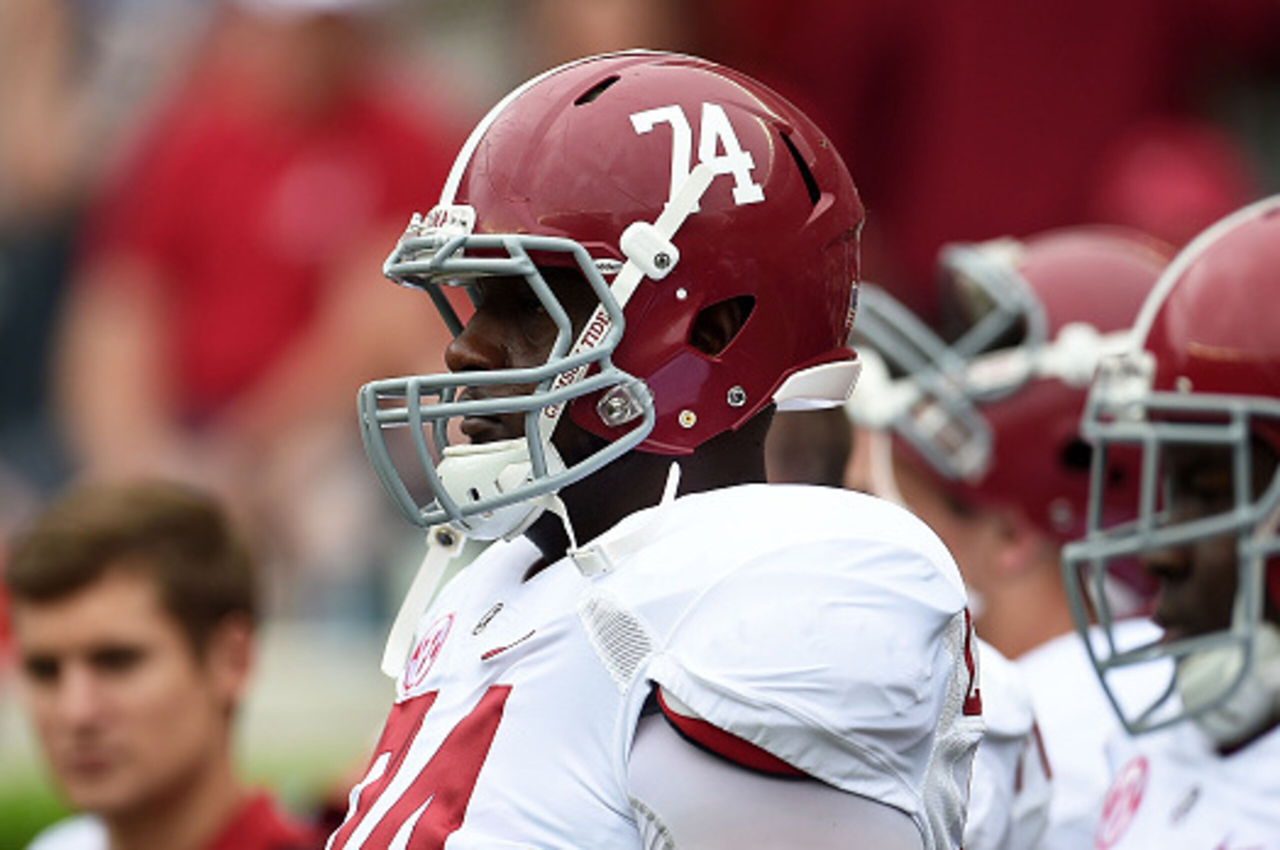 TUSCALOOSA, AL - APRIL 18:  Cam Robinson #74 of the White team watches action prior to the University of Alabama Crimson Tide A-day spring game at Bryant-Denny Stadium on April 18, 2015 in Tuscaloosa, Alabama.  (Photo by Stacy Revere/Getty Images)