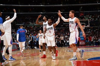 LOS ANGELES, CA - OCTOBER 2:  DeAndre Jordan #6, Chris Paul #3, and Blake Griffin #32 of the Los Angeles Clippers celebrate against the Denver Nuggets during a preseason game on October 2, 2015 at STAPLES Center in Los Angeles, California. NOTE TO USER: U