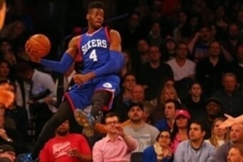 Apr 5, 2015; New York, NY, USA; Philadelphia 76ers center Nerlens Noel (4) saves a ball from going out of bounds against the New York Knicks during the first half at Madison Square Garden. Mandatory Credit: Adam Hunger-USA TODAY Sports