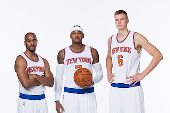 Greenburgh, NY - SEPTEMBER 28:  Arron Afflalo #4, Carmelo Anthony #7 and Kristaps Porzingis #6 of the New York Knicks pose for a portrait at Media Day at the MSG Training Facility in Greenburgh, New York on September 28, 2015. NOTE TO USER: User expressly