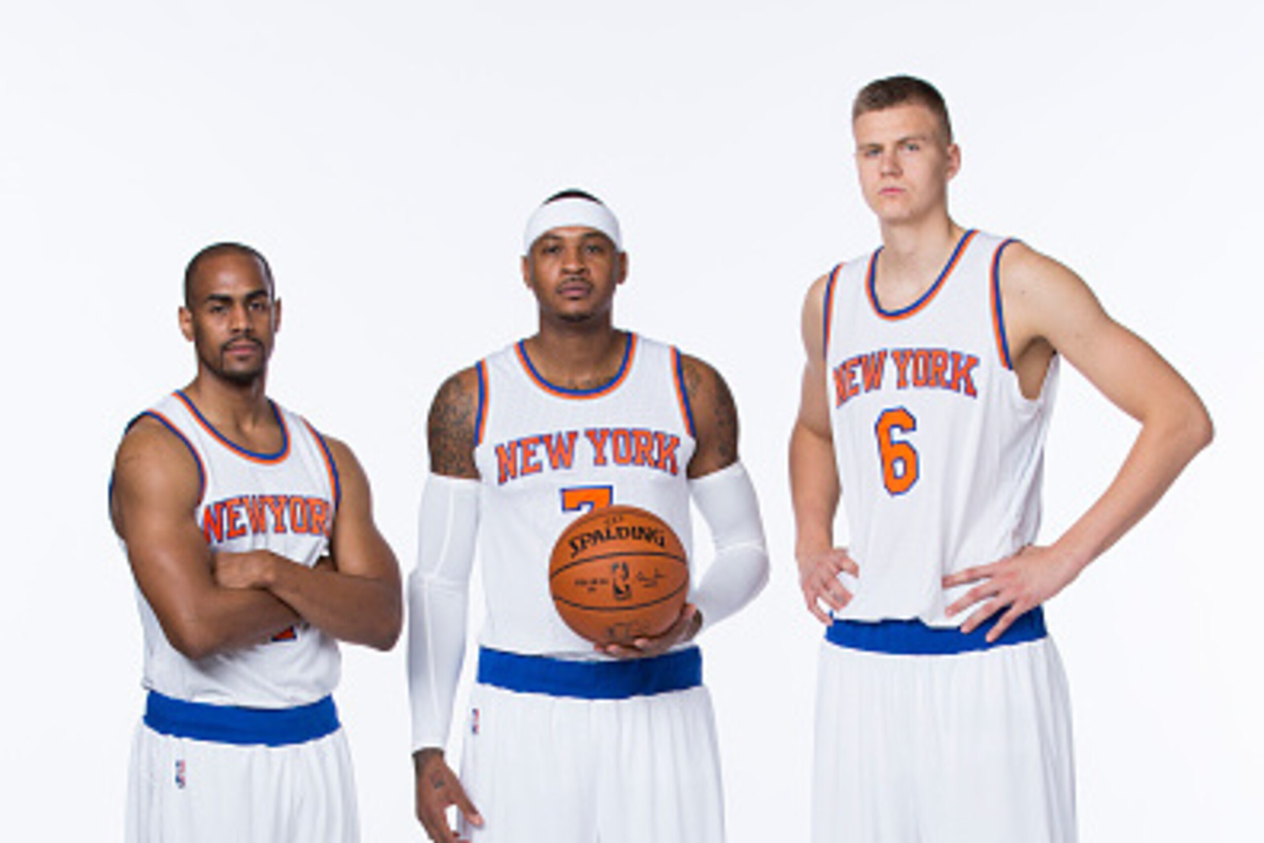 Greenburgh, NY - SEPTEMBER 28:  Arron Afflalo #4, Carmelo Anthony #7 and Kristaps Porzingis #6 of the New York Knicks pose for a portrait at Media Day at the MSG Training Facility in Greenburgh, New York on September 28, 2015. NOTE TO USER: User expressly