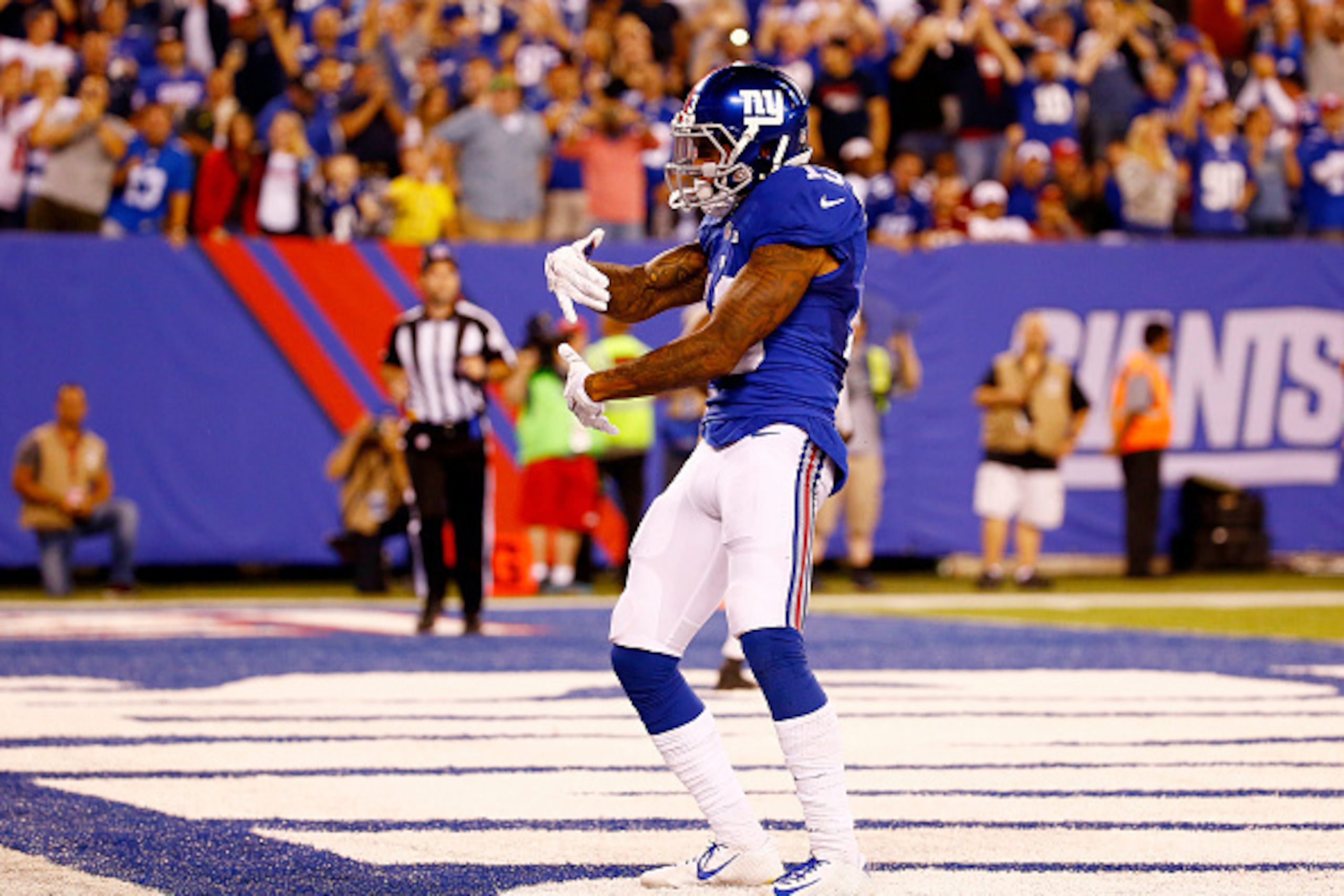 EAST RUTHERFORD, NJ - SEPTEMBER 24:  Odell Beckham #13 of the New York Giants dances in the end zone after scoring a touchdown against the Washington Redskins in the fourth quarter at MetLife Stadium on September 24, 2015 in East Rutherford, New Jersey.  
