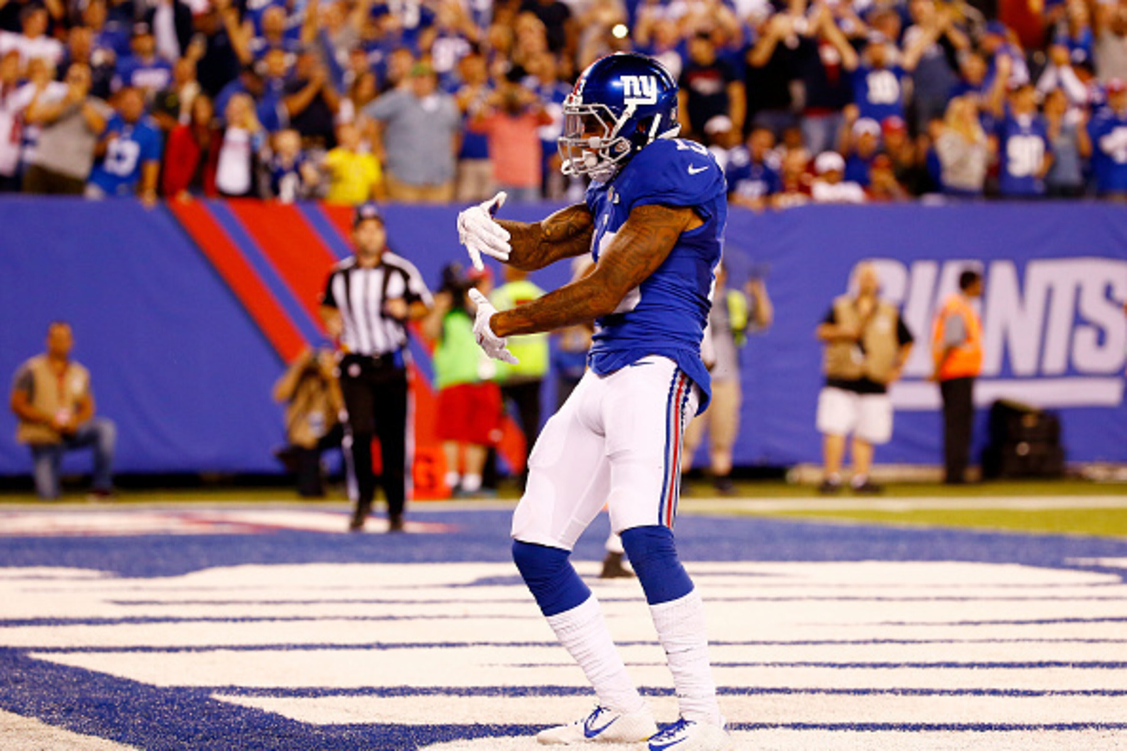 EAST RUTHERFORD, NJ - SEPTEMBER 24:  Odell Beckham #13 of the New York Giants dances in the end zone after scoring a touchdown against the Washington Redskins in the fourth quarter at MetLife Stadium on September 24, 2015 in East Rutherford, New Jersey.  