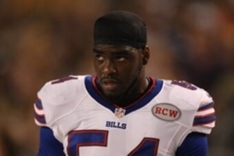 Aug 16, 2014; Pittsburgh, PA, USA; Buffalo Bills linebacker Jacquies Smith (54) stands on the sidelines against the Pittsburgh Steelers during the second half at Heinz Field. The Steelers won the game, 19-16. Mandatory Credit: Jason Bridge-USA TODAY Sport