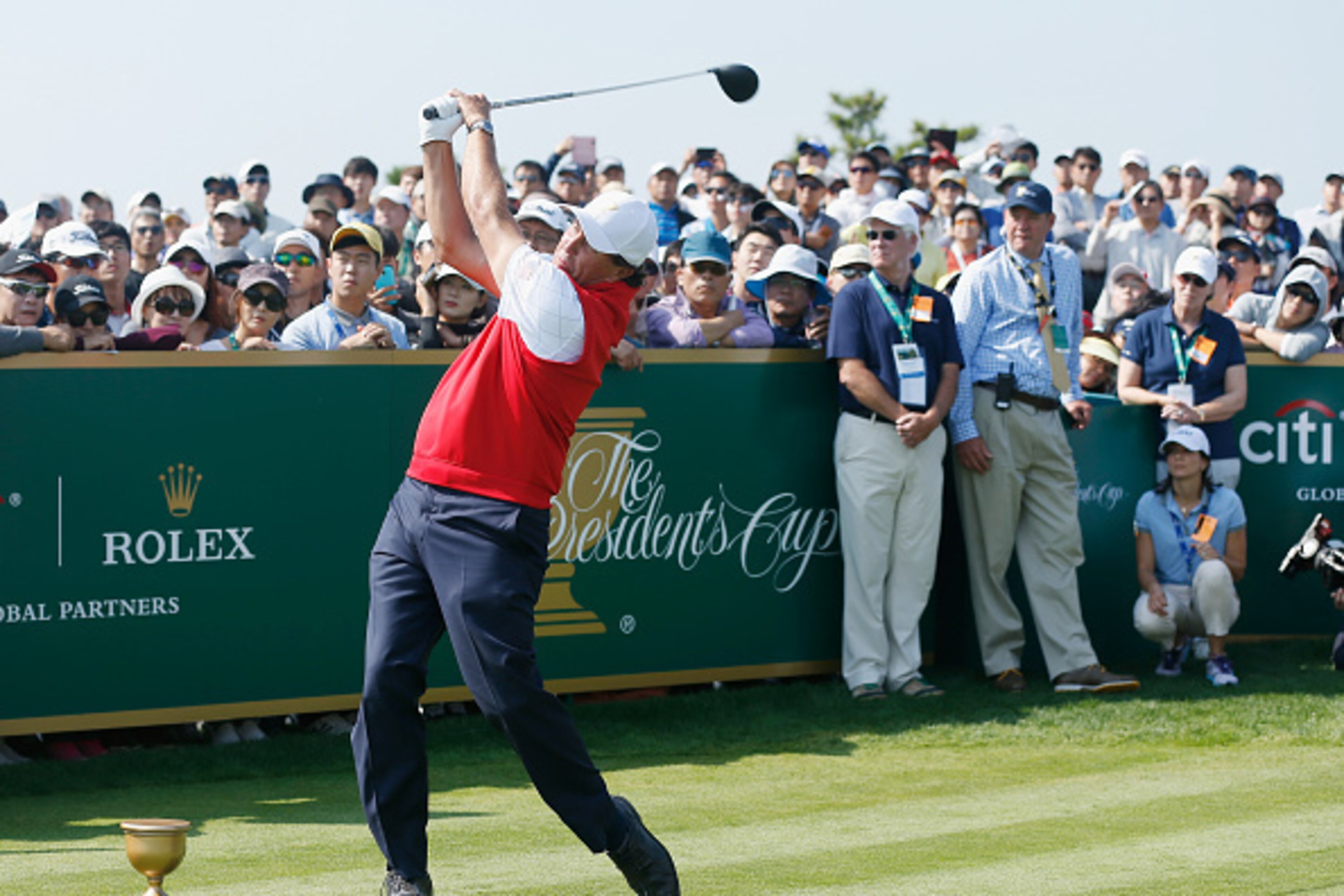 INCHEON CITY, SOUTH KOREA - OCTOBER 08:  Phil Mickelson of the United States Team hits his tee shot on the second hole during the Thursday foursomes matches at The Presidents Cup at Jack Nicklaus Golf Club Korea on October 8, 2015 in Songdo IBD, Incheon C