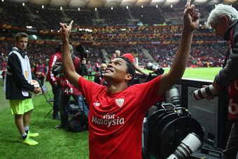 WARSAW, POLAND - MAY 27: Carlos Bacca of Sevilla celebrates scoring his team's third goal during the UEFA Europa League Round Final match between FC Dnipro Dnipropetrovsk and FC Sevilla on May 27, 2015 in Warsaw, Poland.  (Photo by Michael Steele/Getty Im